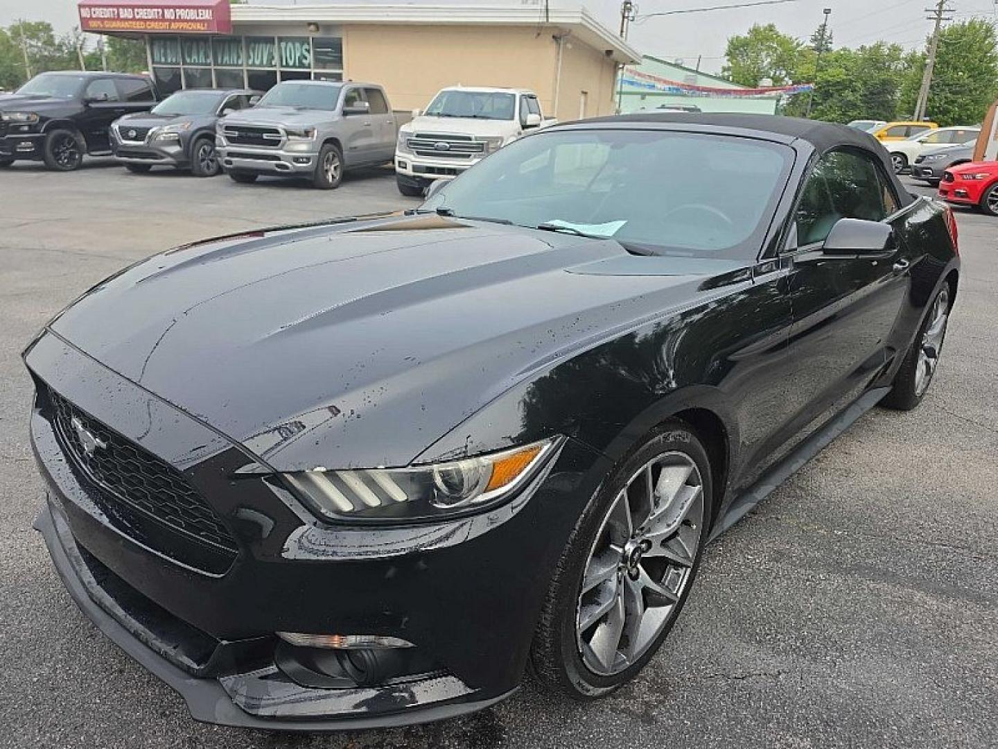 2016 BLACK /BLACK Ford Mustang EcoBoost Premium Convertible (1FATP8UH9G5) with an 2.3L L4 DOHC 16V engine, Auto 6-Spd SelectShift transmission, located at 3304 Woodville Road, Northwood, OH, 43619, (419) 210-8019, 41.612694, -83.480743 - Your #1 Destination for Auto Loans and mdash;No Matter Your Credit!At our dealership, we believe everyone deserves the opportunity to drive their dream car and mdash;whether you have good credit, bad credit, or no credit at all. With a wide selection of hundreds of cars, trucks, and SUVs, you'll fin- Photo#0