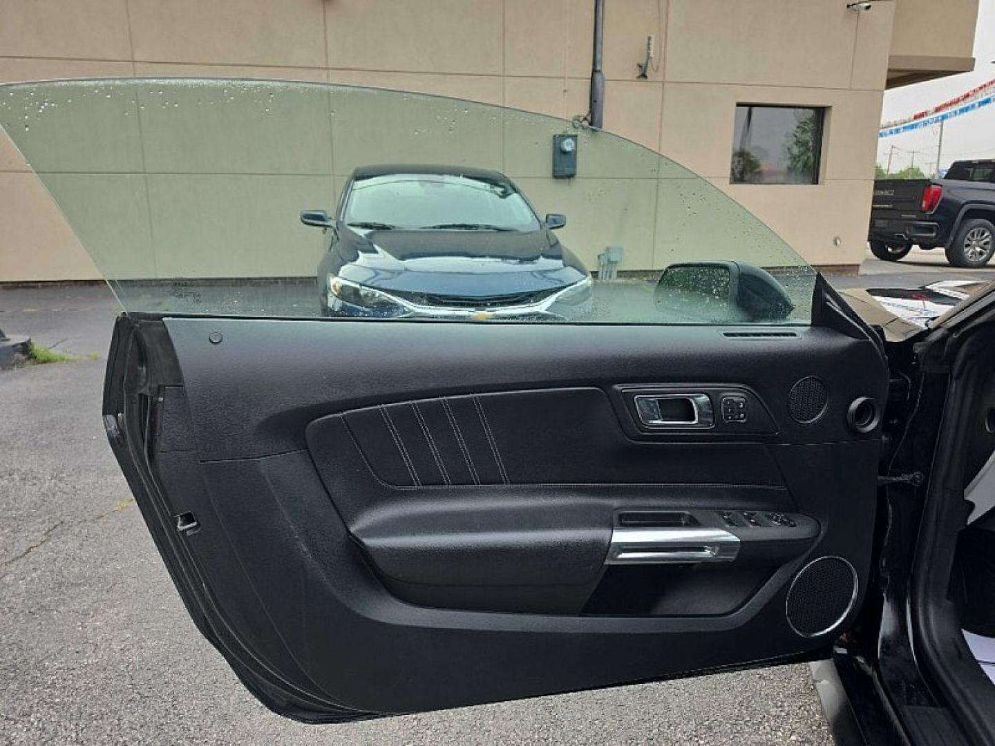 2016 BLACK /BLACK Ford Mustang EcoBoost Premium Convertible (1FATP8UH9G5) with an 2.3L L4 DOHC 16V engine, Auto 6-Spd SelectShift transmission, located at 3304 Woodville Road, Northwood, OH, 43619, (419) 210-8019, 41.612694, -83.480743 - Your #1 Destination for Auto Loans and mdash;No Matter Your Credit!At our dealership, we believe everyone deserves the opportunity to drive their dream car and mdash;whether you have good credit, bad credit, or no credit at all. With a wide selection of hundreds of cars, trucks, and SUVs, you'll fin- Photo#8