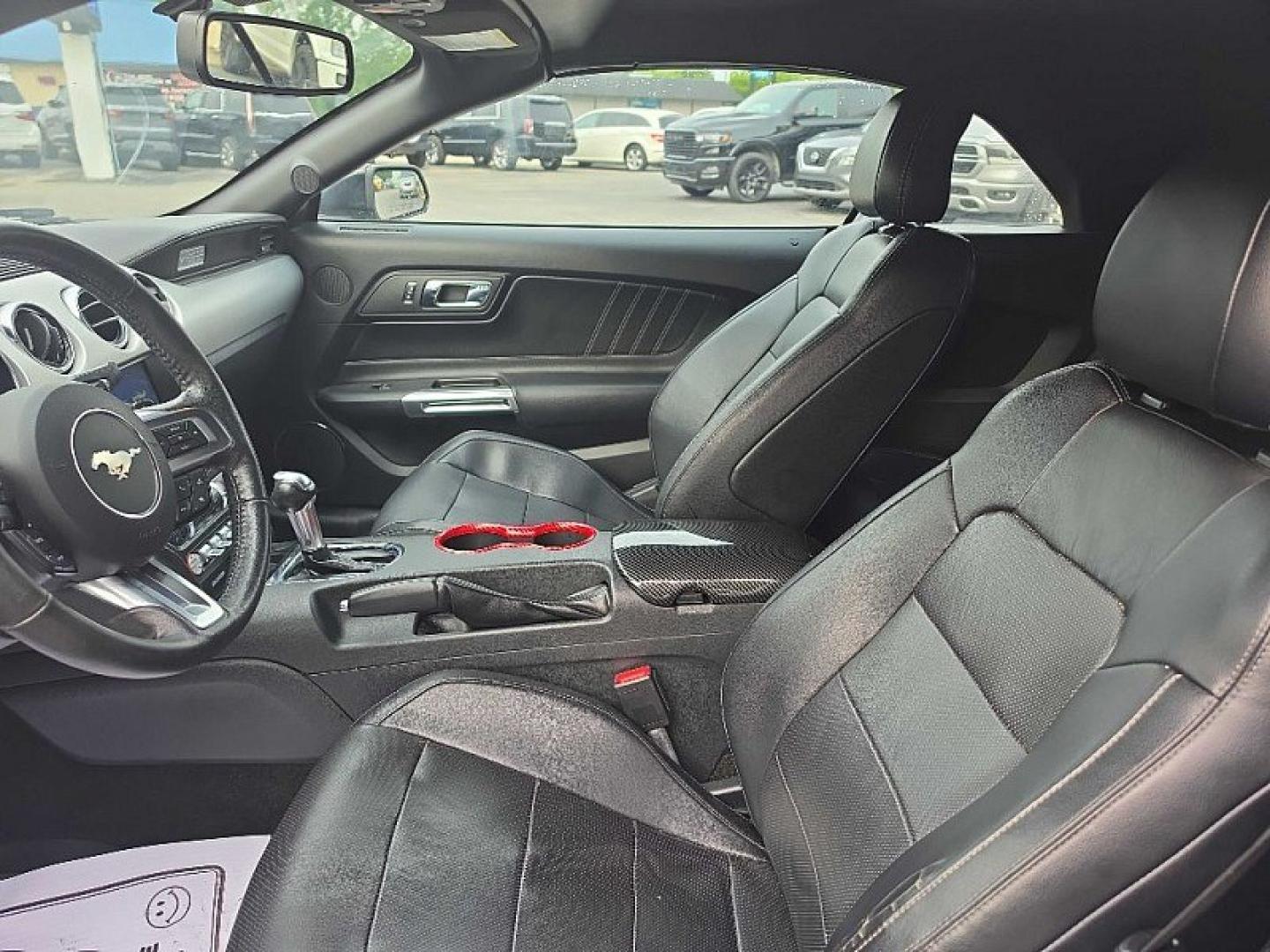 2016 BLACK /BLACK Ford Mustang EcoBoost Premium Convertible (1FATP8UH9G5) with an 2.3L L4 DOHC 16V engine, Auto 6-Spd SelectShift transmission, located at 3304 Woodville Road, Northwood, OH, 43619, (419) 210-8019, 41.612694, -83.480743 - Your #1 Destination for Auto Loans and mdash;No Matter Your Credit!At our dealership, we believe everyone deserves the opportunity to drive their dream car and mdash;whether you have good credit, bad credit, or no credit at all. With a wide selection of hundreds of cars, trucks, and SUVs, you'll fin- Photo#9