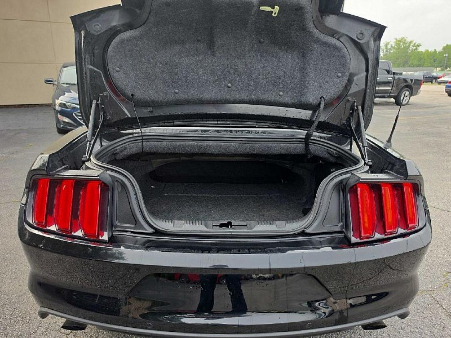 2016 BLACK /BLACK Ford Mustang EcoBoost Premium Convertible (1FATP8UH9G5) with an 2.3L L4 DOHC 16V engine, Auto 6-Spd SelectShift transmission, located at 3304 Woodville Road, Northwood, OH, 43619, (419) 210-8019, 41.612694, -83.480743 - Your #1 Destination for Auto Loans and mdash;No Matter Your Credit!At our dealership, we believe everyone deserves the opportunity to drive their dream car and mdash;whether you have good credit, bad credit, or no credit at all. With a wide selection of hundreds of cars, trucks, and SUVs, you'll fin- Photo#11