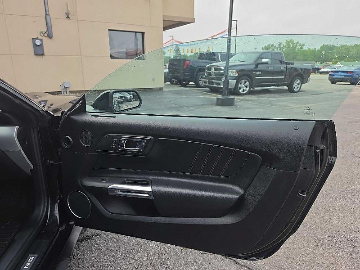 2016 BLACK /BLACK Ford Mustang EcoBoost Premium Convertible (1FATP8UH9G5) with an 2.3L L4 DOHC 16V engine, Auto 6-Spd SelectShift transmission, located at 3304 Woodville Road, Northwood, OH, 43619, (419) 210-8019, 41.612694, -83.480743 - Your #1 Destination for Auto Loans and mdash;No Matter Your Credit!At our dealership, we believe everyone deserves the opportunity to drive their dream car and mdash;whether you have good credit, bad credit, or no credit at all. With a wide selection of hundreds of cars, trucks, and SUVs, you'll fin- Photo#12