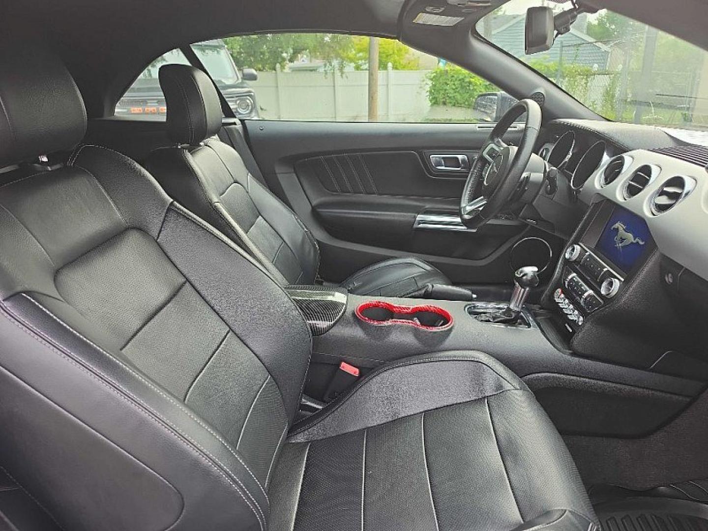 2016 BLACK /BLACK Ford Mustang EcoBoost Premium Convertible (1FATP8UH9G5) with an 2.3L L4 DOHC 16V engine, Auto 6-Spd SelectShift transmission, located at 3304 Woodville Road, Northwood, OH, 43619, (419) 210-8019, 41.612694, -83.480743 - Your #1 Destination for Auto Loans and mdash;No Matter Your Credit!At our dealership, we believe everyone deserves the opportunity to drive their dream car and mdash;whether you have good credit, bad credit, or no credit at all. With a wide selection of hundreds of cars, trucks, and SUVs, you'll fin- Photo#13