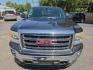 2015 GRAY /GRAY GMC Sierra 1500 SLE Crew Cab Short Box 4WD (3GTU2UEC5FG) with an 5.3L V8 OHV 16V engine, 6-Speed Automatic transmission, located at 3304 Woodville Road, Northwood, OH, 43619, (419) 210-8019, 41.612694, -83.480743 - Your #1 Destination for Auto Loans and mdash;No Matter Your Credit!At our dealership, we believe everyone deserves the opportunity to drive their dream car and mdash;whether you have good credit, bad credit, or no credit at all. With a wide selection of hundreds of cars, trucks, and SUVs, you'll fin- Photo#7