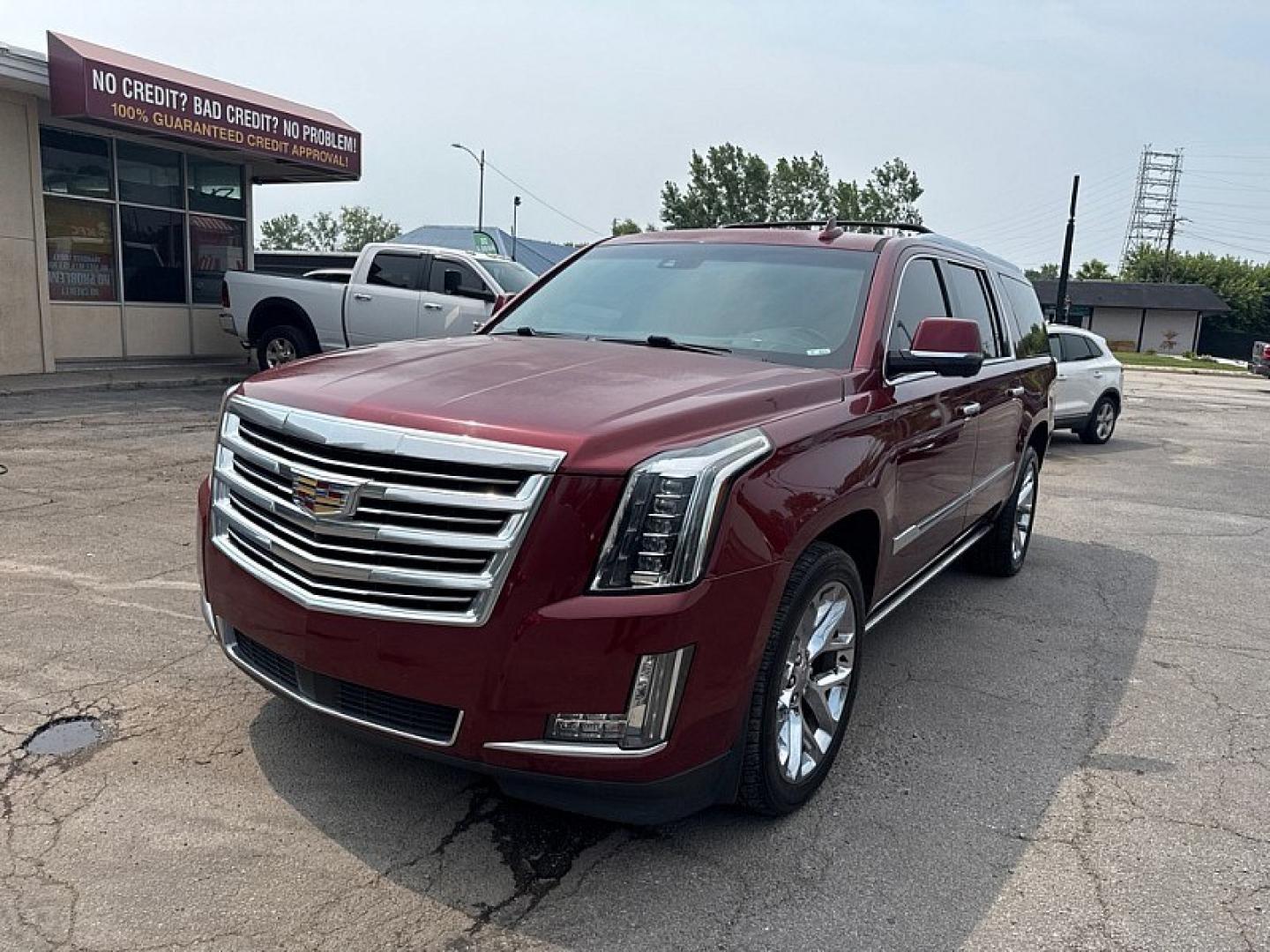 2016 RED /BLACK Cadillac Escalade ESV Platinum 4WD (1GYS4KKJ7GR) with an 6.2L V8 OHV 16V FFV engine, 6A transmission, located at 3304 Woodville Road, Northwood, OH, 43619, (419) 210-8019, 41.612694, -83.480743 - Your #1 Destination for Auto Loans and mdash;No Matter Your Credit!At our dealership, we believe everyone deserves the opportunity to drive their dream car and mdash;whether you have good credit, bad credit, or no credit at all. With a wide selection of hundreds of cars, trucks, and SUVs, you'll fin- Photo#0