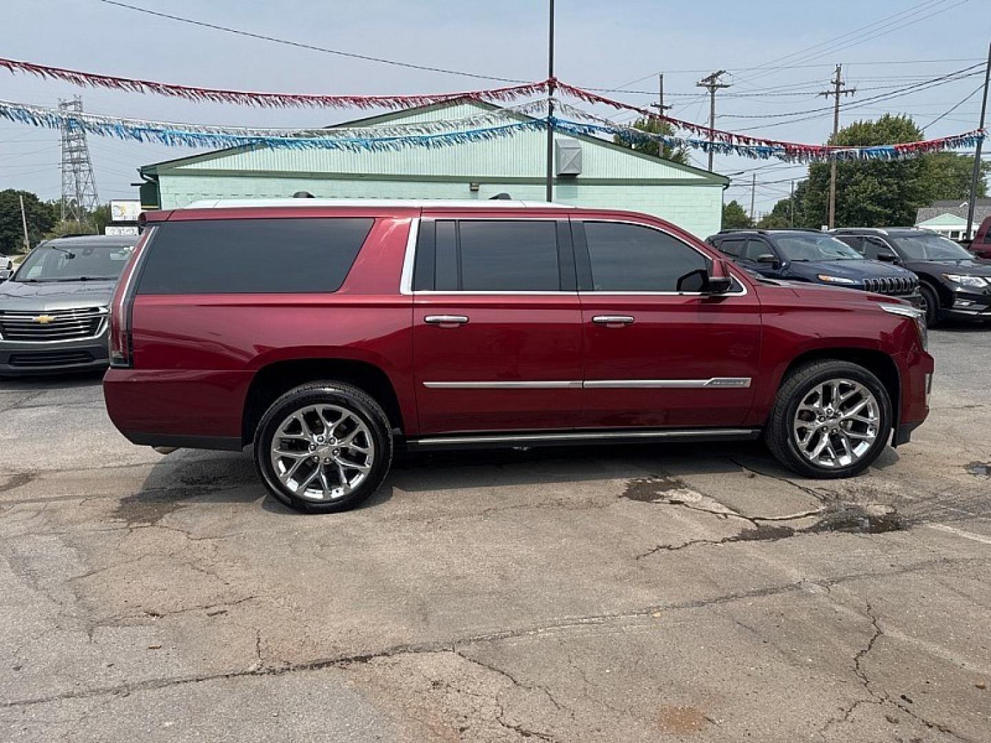 2016 RED /BLACK Cadillac Escalade ESV Platinum 4WD (1GYS4KKJ7GR) with an 6.2L V8 OHV 16V FFV engine, 6A transmission, located at 3304 Woodville Road, Northwood, OH, 43619, (419) 210-8019, 41.612694, -83.480743 - Your #1 Destination for Auto Loans and mdash;No Matter Your Credit!At our dealership, we believe everyone deserves the opportunity to drive their dream car and mdash;whether you have good credit, bad credit, or no credit at all. With a wide selection of hundreds of cars, trucks, and SUVs, you'll fin- Photo#5