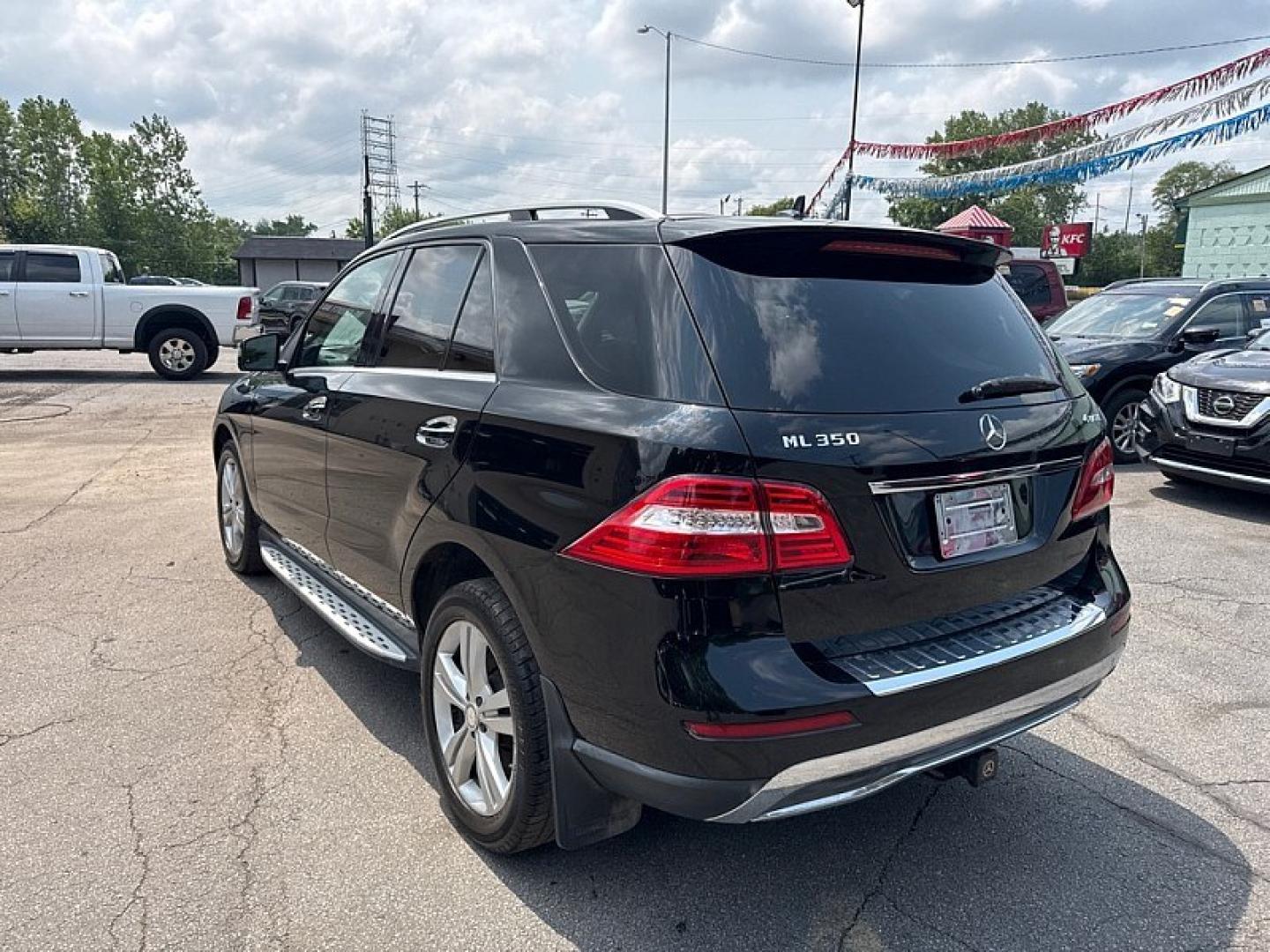2015 BLACK /BLACK Mercedes-Benz M-Class ML350 4MATIC (4JGDA5HB4FA) with an 3.5L V6 DOHC 24V engine, 7-Speed Automatic transmission, located at 3304 Woodville Road, Northwood, OH, 43619, (419) 210-8019, 41.612694, -83.480743 - Your #1 Destination for Auto Loans and mdash;No Matter Your Credit!At our dealership, we believe everyone deserves the opportunity to drive their dream car and mdash;whether you have good credit, bad credit, or no credit at all. With a wide selection of hundreds of cars, trucks, and SUVs, you'll fin- Photo#2