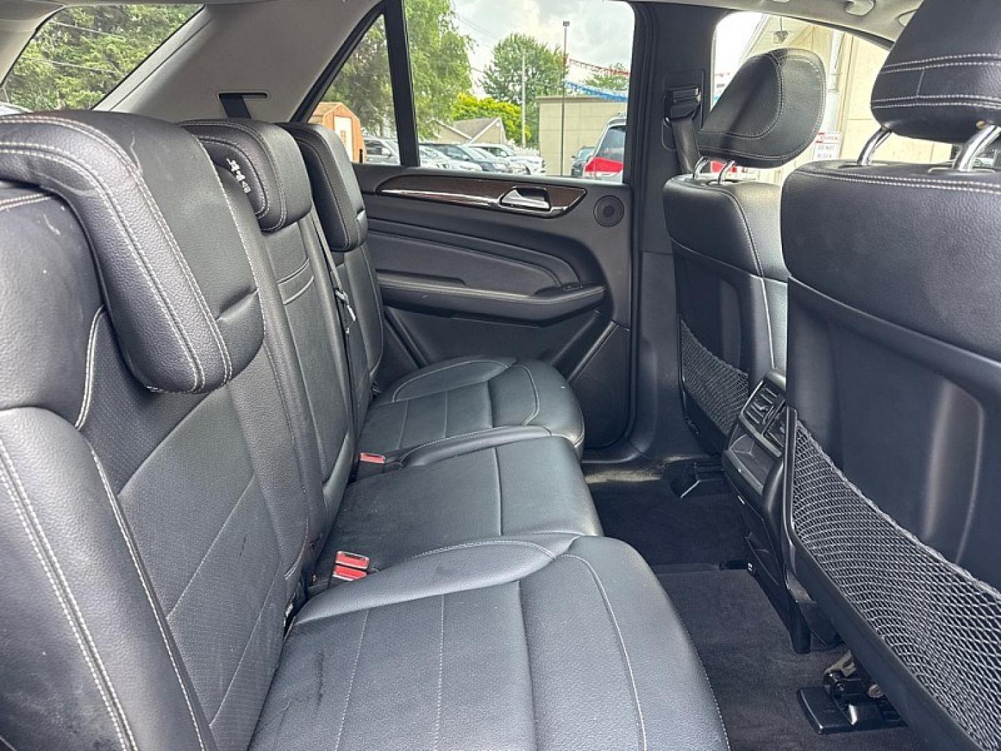 2015 BLACK /BLACK Mercedes-Benz M-Class ML350 4MATIC (4JGDA5HB4FA) with an 3.5L V6 DOHC 24V engine, 7-Speed Automatic transmission, located at 3304 Woodville Road, Northwood, OH, 43619, (419) 210-8019, 41.612694, -83.480743 - Your #1 Destination for Auto Loans and mdash;No Matter Your Credit!At our dealership, we believe everyone deserves the opportunity to drive their dream car and mdash;whether you have good credit, bad credit, or no credit at all. With a wide selection of hundreds of cars, trucks, and SUVs, you'll fin- Photo#14
