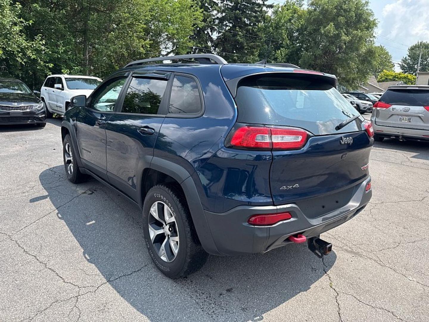 2018 BLUE /BLACK Jeep Cherokee Trailhawk 4WD (1C4PJMBBXJD) with an 2.4L L4 DOHC 16V engine, 9A transmission, located at 3304 Woodville Road, Northwood, OH, 43619, (419) 210-8019, 41.612694, -83.480743 - Your #1 Destination for Auto Loans and mdash;No Matter Your Credit!At our dealership, we believe everyone deserves the opportunity to drive their dream car and mdash;whether you have good credit, bad credit, or no credit at all. With a wide selection of hundreds of cars, trucks, and SUVs, you'll fin- Photo#2