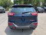 2018 BLUE /BLACK Jeep Cherokee Trailhawk 4WD (1C4PJMBBXJD) with an 2.4L L4 DOHC 16V engine, 9A transmission, located at 3304 Woodville Road, Northwood, OH, 43619, (419) 210-8019, 41.612694, -83.480743 - Your #1 Destination for Auto Loans and mdash;No Matter Your Credit!At our dealership, we believe everyone deserves the opportunity to drive their dream car and mdash;whether you have good credit, bad credit, or no credit at all. With a wide selection of hundreds of cars, trucks, and SUVs, you'll fin- Photo#3