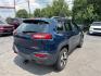 2018 BLUE /BLACK Jeep Cherokee Trailhawk 4WD (1C4PJMBBXJD) with an 2.4L L4 DOHC 16V engine, 9A transmission, located at 3304 Woodville Road, Northwood, OH, 43619, (419) 210-8019, 41.612694, -83.480743 - Your #1 Destination for Auto Loans and mdash;No Matter Your Credit!At our dealership, we believe everyone deserves the opportunity to drive their dream car and mdash;whether you have good credit, bad credit, or no credit at all. With a wide selection of hundreds of cars, trucks, and SUVs, you'll fin- Photo#4