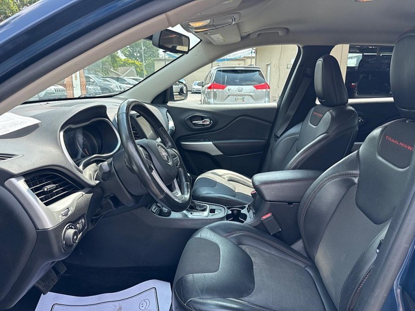 2018 BLUE /BLACK Jeep Cherokee Trailhawk 4WD (1C4PJMBBXJD) with an 2.4L L4 DOHC 16V engine, 9A transmission, located at 3304 Woodville Road, Northwood, OH, 43619, (419) 210-8019, 41.612694, -83.480743 - Your #1 Destination for Auto Loans and mdash;No Matter Your Credit!At our dealership, we believe everyone deserves the opportunity to drive their dream car and mdash;whether you have good credit, bad credit, or no credit at all. With a wide selection of hundreds of cars, trucks, and SUVs, you'll fin- Photo#9