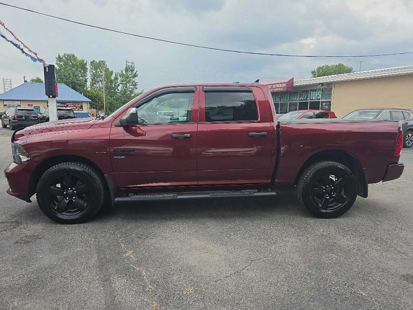 2019 MAROON /BLACK RAM 1500 Tradesman Crew Cab SWB 4WD (1C6RR7KT7KS) with an 5.7L V8 OHV 16V engine, 8A transmission, located at 3304 Woodville Road, Northwood, OH, 43619, (419) 210-8019, 41.612694, -83.480743 - Your #1 Destination for Auto Loans and mdash;No Matter Your Credit!At our dealership, we believe everyone deserves the opportunity to drive their dream car and mdash;whether you have good credit, bad credit, or no credit at all. With a wide selection of hundreds of cars, trucks, and SUVs, you'll fin- Photo#1
