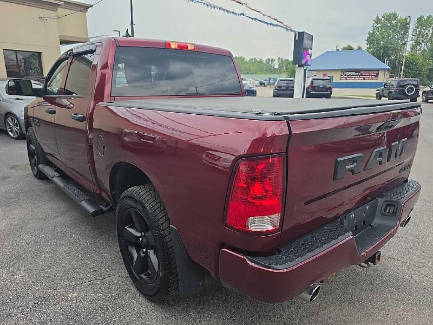 2019 MAROON /BLACK RAM 1500 Tradesman Crew Cab SWB 4WD (1C6RR7KT7KS) with an 5.7L V8 OHV 16V engine, 8A transmission, located at 3304 Woodville Road, Northwood, OH, 43619, (419) 210-8019, 41.612694, -83.480743 - Your #1 Destination for Auto Loans and mdash;No Matter Your Credit!At our dealership, we believe everyone deserves the opportunity to drive their dream car and mdash;whether you have good credit, bad credit, or no credit at all. With a wide selection of hundreds of cars, trucks, and SUVs, you'll fin- Photo#2