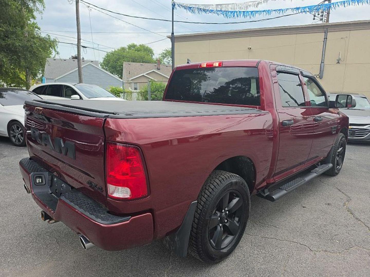 2019 MAROON /BLACK RAM 1500 Tradesman Crew Cab SWB 4WD (1C6RR7KT7KS) with an 5.7L V8 OHV 16V engine, 8A transmission, located at 3304 Woodville Road, Northwood, OH, 43619, (419) 210-8019, 41.612694, -83.480743 - Your #1 Destination for Auto Loans and mdash;No Matter Your Credit!At our dealership, we believe everyone deserves the opportunity to drive their dream car and mdash;whether you have good credit, bad credit, or no credit at all. With a wide selection of hundreds of cars, trucks, and SUVs, you'll fin- Photo#4