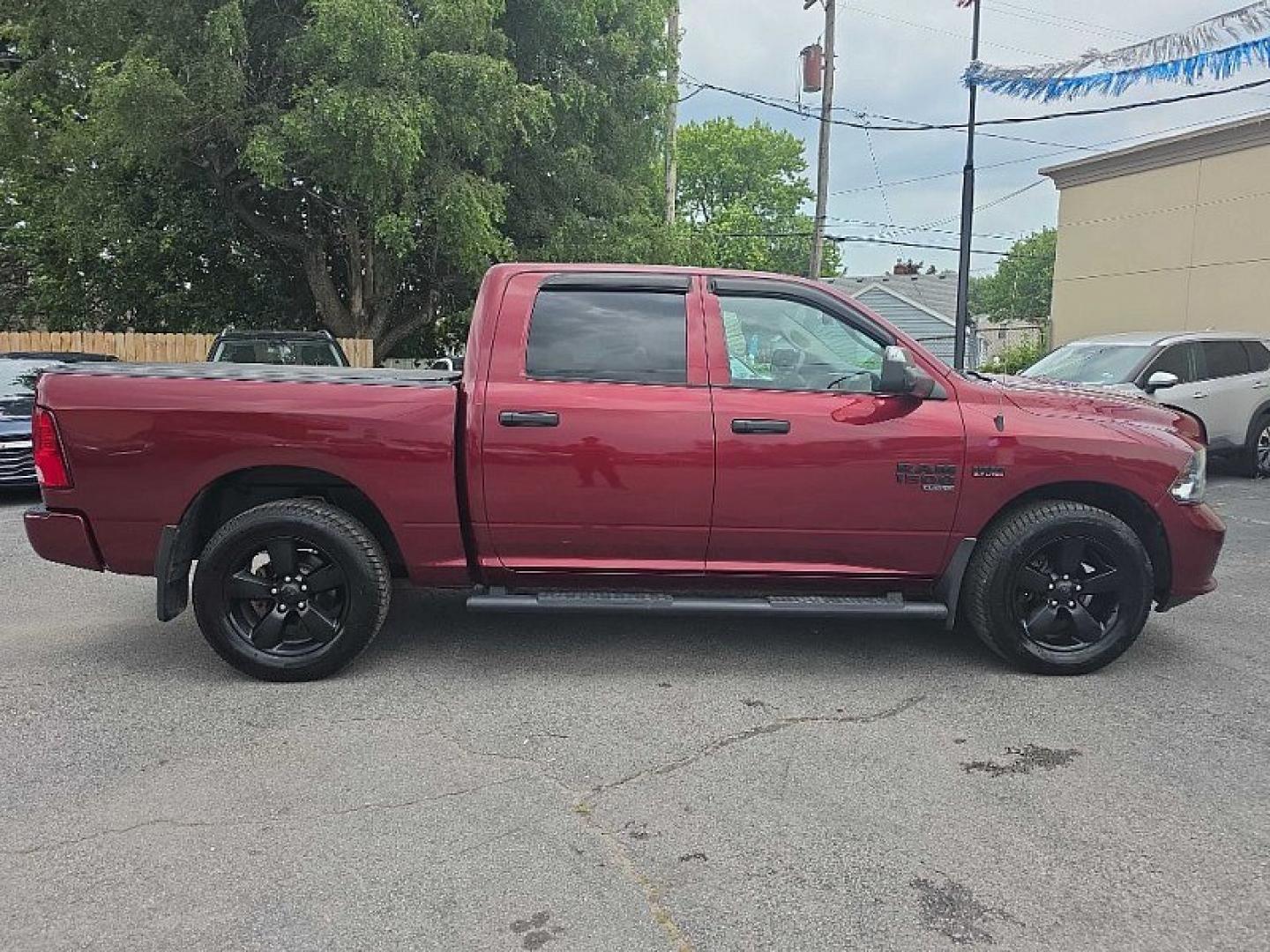 2019 MAROON /BLACK RAM 1500 Tradesman Crew Cab SWB 4WD (1C6RR7KT7KS) with an 5.7L V8 OHV 16V engine, 8A transmission, located at 3304 Woodville Road, Northwood, OH, 43619, (419) 210-8019, 41.612694, -83.480743 - Your #1 Destination for Auto Loans and mdash;No Matter Your Credit!At our dealership, we believe everyone deserves the opportunity to drive their dream car and mdash;whether you have good credit, bad credit, or no credit at all. With a wide selection of hundreds of cars, trucks, and SUVs, you'll fin- Photo#5