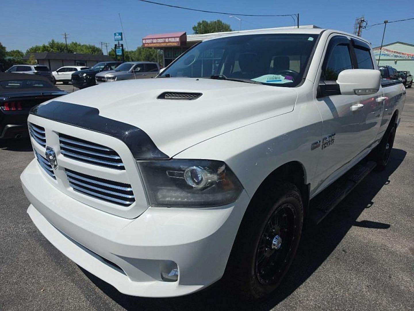 2016 WHITE /BLACK RAM 1500 Sport Crew Cab LWB 4WD (1C6RR7UT9GS) with an 5.7L V8 OHV 16V engine, 6A transmission, located at 3304 Woodville Road, Northwood, OH, 43619, (419) 210-8019, 41.612694, -83.480743 - Your #1 Destination for Auto Loans and mdash;No Matter Your Credit!At our dealership, we believe everyone deserves the opportunity to drive their dream car and mdash;whether you have good credit, bad credit, or no credit at all. With a wide selection of hundreds of cars, trucks, and SUVs, you'll fin- Photo#0