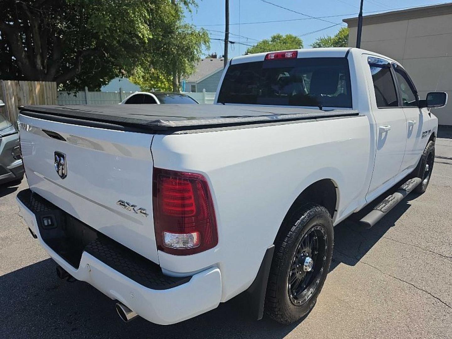 2016 WHITE /BLACK RAM 1500 Sport Crew Cab LWB 4WD (1C6RR7UT9GS) with an 5.7L V8 OHV 16V engine, 6A transmission, located at 3304 Woodville Road, Northwood, OH, 43619, (419) 210-8019, 41.612694, -83.480743 - Your #1 Destination for Auto Loans and mdash;No Matter Your Credit!At our dealership, we believe everyone deserves the opportunity to drive their dream car and mdash;whether you have good credit, bad credit, or no credit at all. With a wide selection of hundreds of cars, trucks, and SUVs, you'll fin- Photo#4