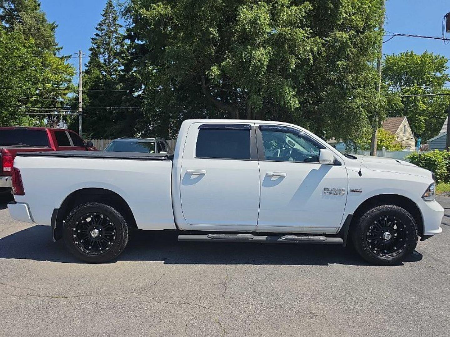 2016 WHITE /BLACK RAM 1500 Sport Crew Cab LWB 4WD (1C6RR7UT9GS) with an 5.7L V8 OHV 16V engine, 6A transmission, located at 3304 Woodville Road, Northwood, OH, 43619, (419) 210-8019, 41.612694, -83.480743 - Your #1 Destination for Auto Loans and mdash;No Matter Your Credit!At our dealership, we believe everyone deserves the opportunity to drive their dream car and mdash;whether you have good credit, bad credit, or no credit at all. With a wide selection of hundreds of cars, trucks, and SUVs, you'll fin- Photo#5