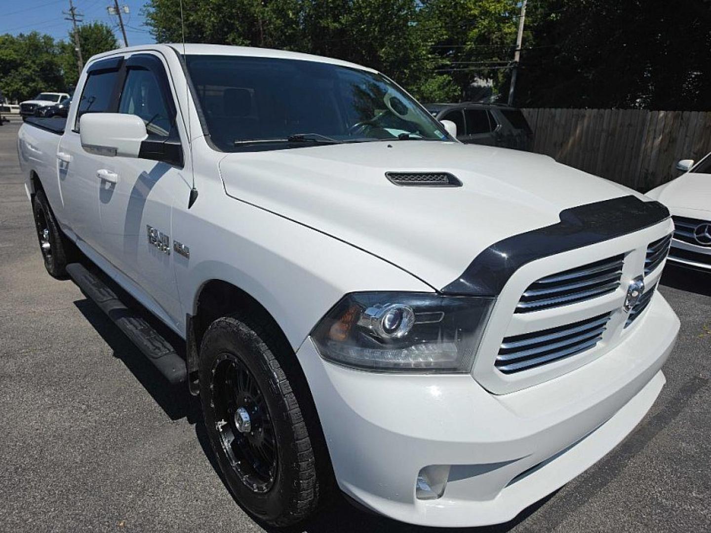 2016 WHITE /BLACK RAM 1500 Sport Crew Cab LWB 4WD (1C6RR7UT9GS) with an 5.7L V8 OHV 16V engine, 6A transmission, located at 3304 Woodville Road, Northwood, OH, 43619, (419) 210-8019, 41.612694, -83.480743 - Your #1 Destination for Auto Loans and mdash;No Matter Your Credit!At our dealership, we believe everyone deserves the opportunity to drive their dream car and mdash;whether you have good credit, bad credit, or no credit at all. With a wide selection of hundreds of cars, trucks, and SUVs, you'll fin- Photo#6
