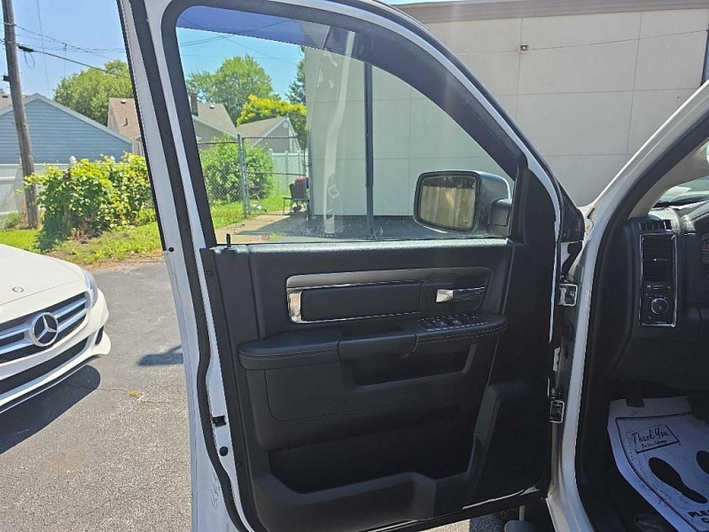 2016 WHITE /BLACK RAM 1500 Sport Crew Cab LWB 4WD (1C6RR7UT9GS) with an 5.7L V8 OHV 16V engine, 6A transmission, located at 3304 Woodville Road, Northwood, OH, 43619, (419) 210-8019, 41.612694, -83.480743 - Your #1 Destination for Auto Loans and mdash;No Matter Your Credit!At our dealership, we believe everyone deserves the opportunity to drive their dream car and mdash;whether you have good credit, bad credit, or no credit at all. With a wide selection of hundreds of cars, trucks, and SUVs, you'll fin- Photo#8