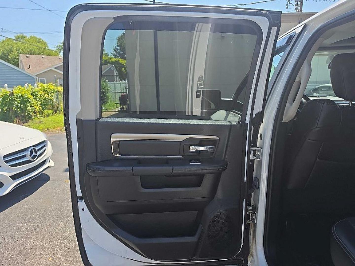 2016 WHITE /BLACK RAM 1500 Sport Crew Cab LWB 4WD (1C6RR7UT9GS) with an 5.7L V8 OHV 16V engine, 6A transmission, located at 3304 Woodville Road, Northwood, OH, 43619, (419) 210-8019, 41.612694, -83.480743 - Your #1 Destination for Auto Loans and mdash;No Matter Your Credit!At our dealership, we believe everyone deserves the opportunity to drive their dream car and mdash;whether you have good credit, bad credit, or no credit at all. With a wide selection of hundreds of cars, trucks, and SUVs, you'll fin- Photo#11