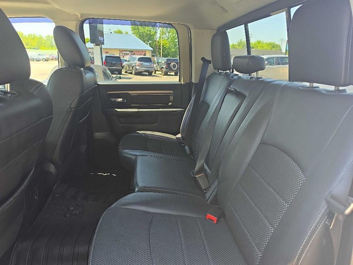 2016 WHITE /BLACK RAM 1500 Sport Crew Cab LWB 4WD (1C6RR7UT9GS) with an 5.7L V8 OHV 16V engine, 6A transmission, located at 3304 Woodville Road, Northwood, OH, 43619, (419) 210-8019, 41.612694, -83.480743 - Your #1 Destination for Auto Loans and mdash;No Matter Your Credit!At our dealership, we believe everyone deserves the opportunity to drive their dream car and mdash;whether you have good credit, bad credit, or no credit at all. With a wide selection of hundreds of cars, trucks, and SUVs, you'll fin- Photo#12