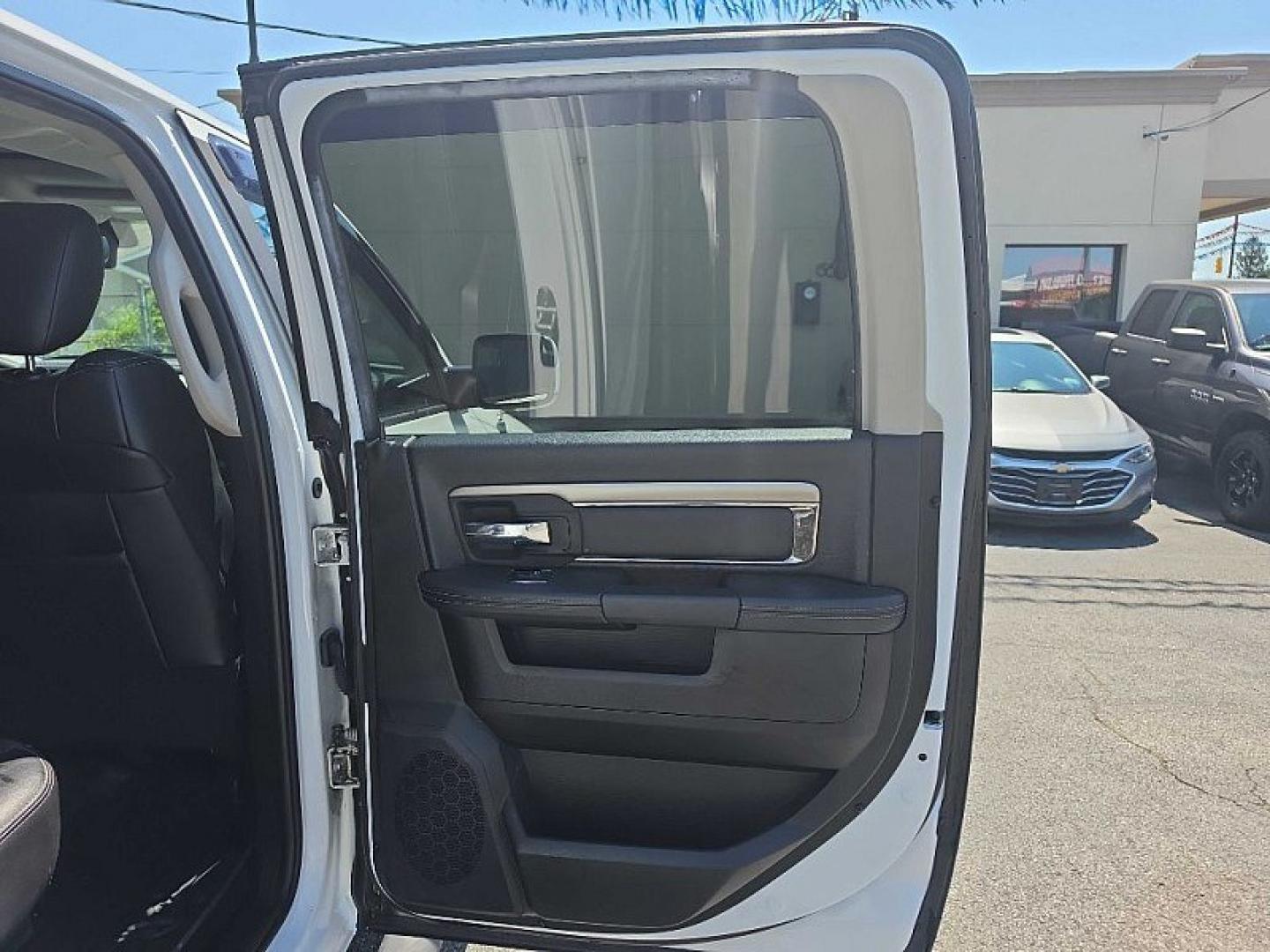 2016 WHITE /BLACK RAM 1500 Sport Crew Cab LWB 4WD (1C6RR7UT9GS) with an 5.7L V8 OHV 16V engine, 6A transmission, located at 3304 Woodville Road, Northwood, OH, 43619, (419) 210-8019, 41.612694, -83.480743 - Your #1 Destination for Auto Loans and mdash;No Matter Your Credit!At our dealership, we believe everyone deserves the opportunity to drive their dream car and mdash;whether you have good credit, bad credit, or no credit at all. With a wide selection of hundreds of cars, trucks, and SUVs, you'll fin- Photo#13