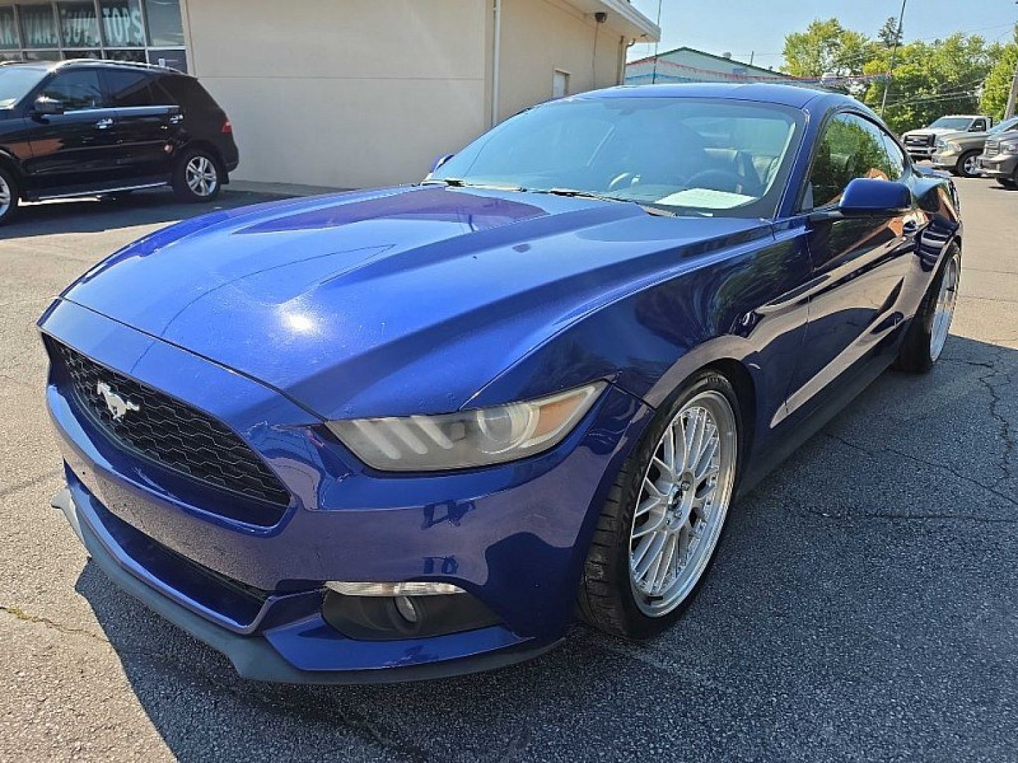 2015 BLUE /BLACK Ford Mustang EcoBoost Coupe (1FA6P8TH0F5) with an 2.3L L4 DOHC 16V engine, Auto 6-Spd SelectShift transmission, located at 3304 Woodville Road, Northwood, OH, 43619, (419) 210-8019, 41.612694, -83.480743- Photo#0