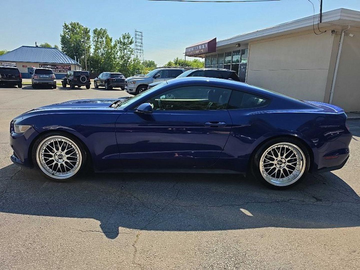 2015 BLUE /BLACK Ford Mustang EcoBoost Coupe (1FA6P8TH0F5) with an 2.3L L4 DOHC 16V engine, Auto 6-Spd SelectShift transmission, located at 3304 Woodville Road, Northwood, OH, 43619, (419) 210-8019, 41.612694, -83.480743- Photo#1