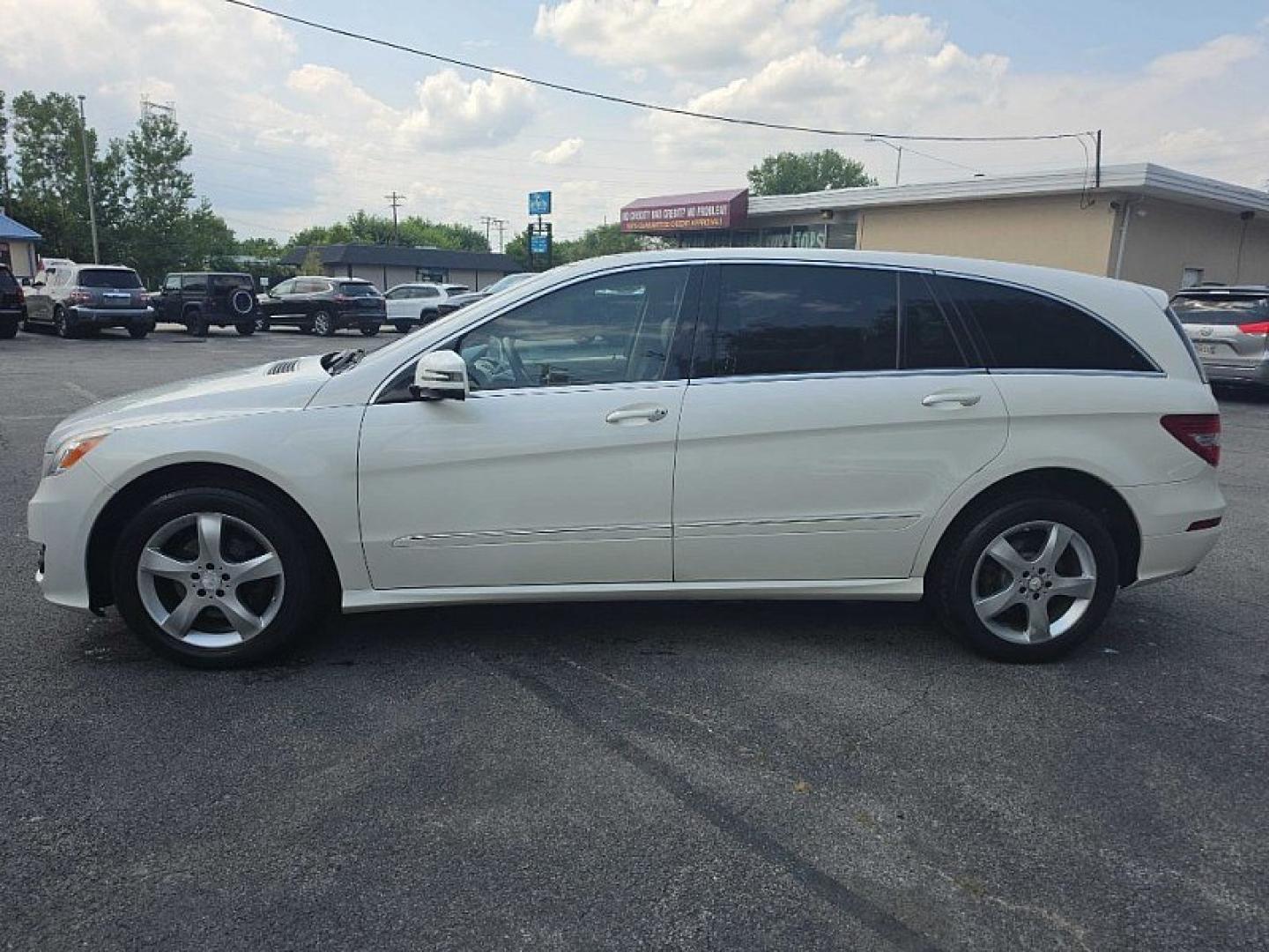 2011 WHITE /BEIGE Mercedes-Benz R-Class R350 4MATIC w/ 3rd Row (4JGCB6FE3BA) with an 3.5L V6 DOHC 24V engine, 7A transmission, located at 3304 Woodville Road, Northwood, OH, 43619, (419) 210-8019, 41.612694, -83.480743 - Your #1 Destination for Auto Loans and mdash;No Matter Your Credit!At our dealership, we believe everyone deserves the opportunity to drive their dream car and mdash;whether you have good credit, bad credit, or no credit at all. With a wide selection of hundreds of cars, trucks, and SUVs, you'll fin- Photo#1