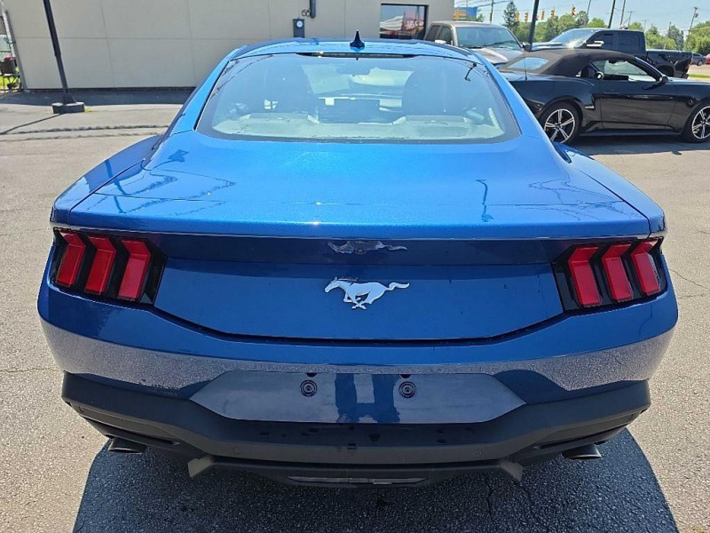 2024 BLUE /BLACK Ford Mustang EcoBoost Coupe (1FA6P8TH9R5) with an 2.3L L4 DOHC 16V engine, Automatic 10-Spd w/SelectShift transmission, located at 3304 Woodville Road, Northwood, OH, 43619, (419) 210-8019, 41.612694, -83.480743 - Your #1 Destination for Auto Loans and mdash;No Matter Your Credit!At our dealership, we believe everyone deserves the opportunity to drive their dream car and mdash;whether you have good credit, bad credit, or no credit at all. With a wide selection of hundreds of cars, trucks, and SUVs, you'll fin- Photo#3