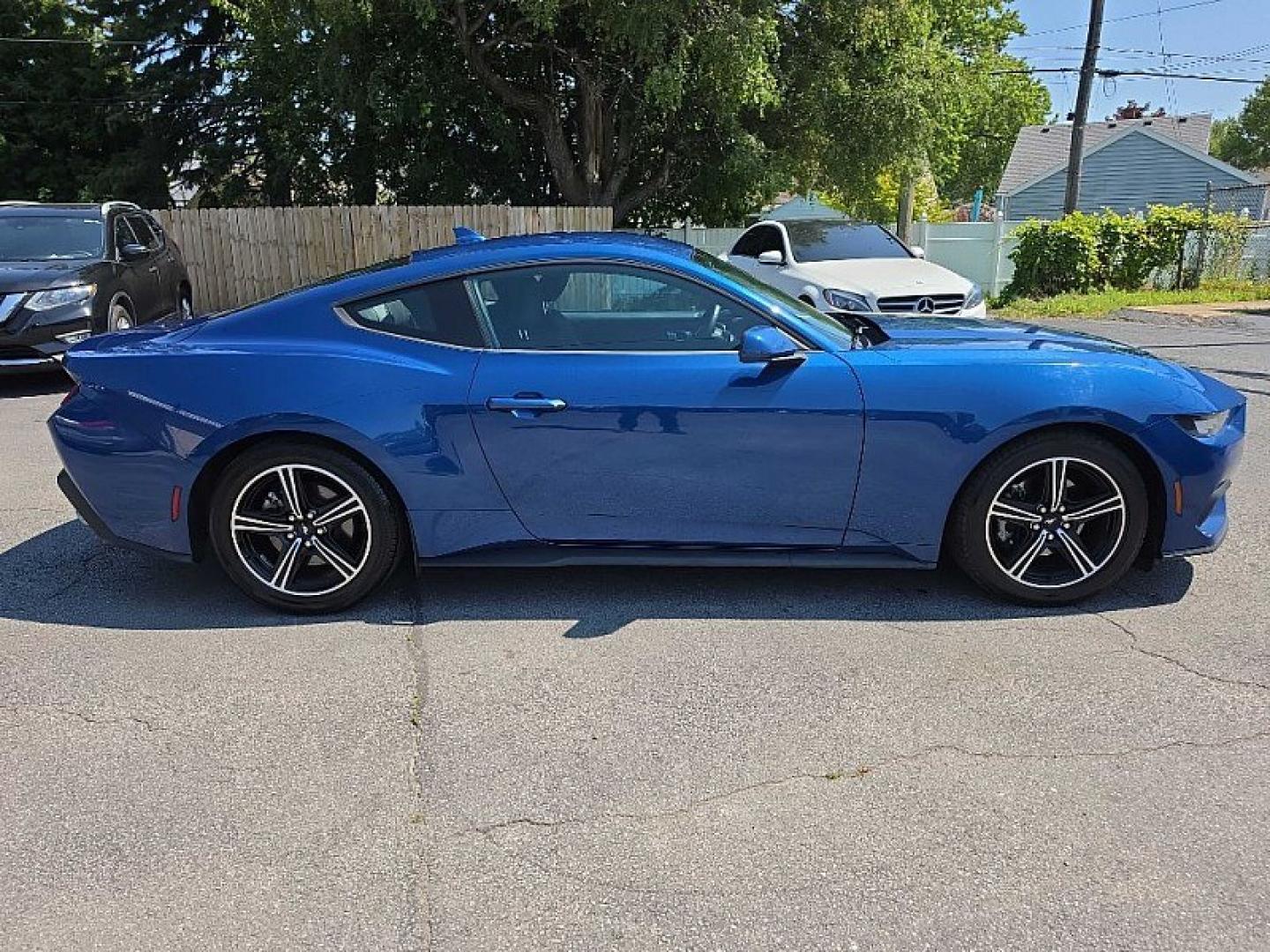 2024 BLUE /BLACK Ford Mustang EcoBoost Coupe (1FA6P8TH9R5) with an 2.3L L4 DOHC 16V engine, Automatic 10-Spd w/SelectShift transmission, located at 3304 Woodville Road, Northwood, OH, 43619, (419) 210-8019, 41.612694, -83.480743 - Your #1 Destination for Auto Loans and mdash;No Matter Your Credit!At our dealership, we believe everyone deserves the opportunity to drive their dream car and mdash;whether you have good credit, bad credit, or no credit at all. With a wide selection of hundreds of cars, trucks, and SUVs, you'll fin- Photo#5