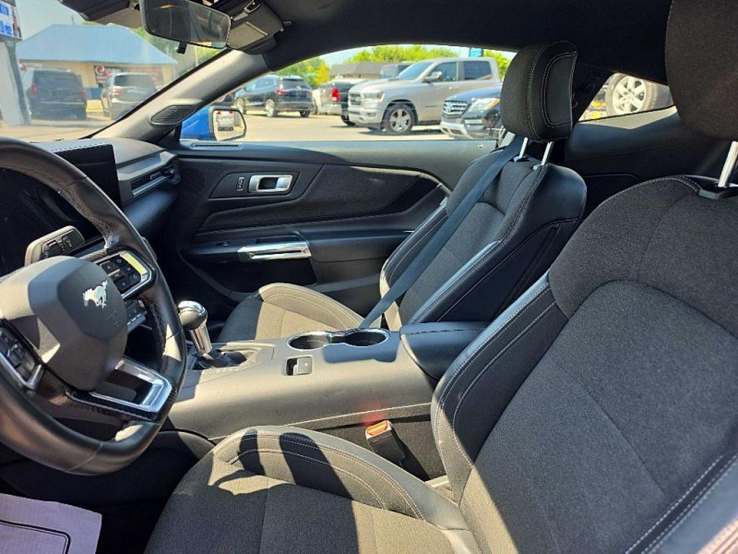 2024 BLUE /BLACK Ford Mustang EcoBoost Coupe (1FA6P8TH9R5) with an 2.3L L4 DOHC 16V engine, Automatic 10-Spd w/SelectShift transmission, located at 3304 Woodville Road, Northwood, OH, 43619, (419) 210-8019, 41.612694, -83.480743 - Your #1 Destination for Auto Loans and mdash;No Matter Your Credit!At our dealership, we believe everyone deserves the opportunity to drive their dream car and mdash;whether you have good credit, bad credit, or no credit at all. With a wide selection of hundreds of cars, trucks, and SUVs, you'll fin- Photo#9