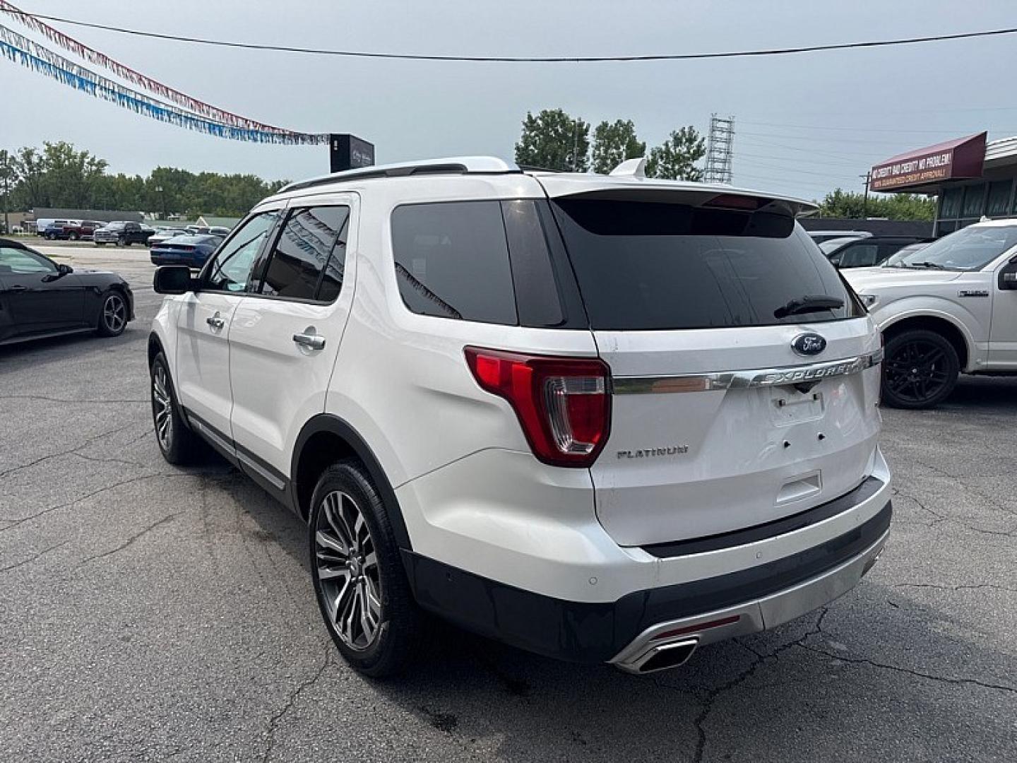 2017 WHITE /BLACK Ford Explorer Platinum AWD (1FM5K8HT1HG) with an 3.5L V6 DOHC 24V engine, 6A transmission, located at 3304 Woodville Road, Northwood, OH, 43619, (419) 210-8019, 41.612694, -83.480743 - Your #1 Destination for Auto Loans and mdash;No Matter Your Credit!At our dealership, we believe everyone deserves the opportunity to drive their dream car and mdash;whether you have good credit, bad credit, or no credit at all. With a wide selection of hundreds of cars, trucks, and SUVs, you'll fin- Photo#2