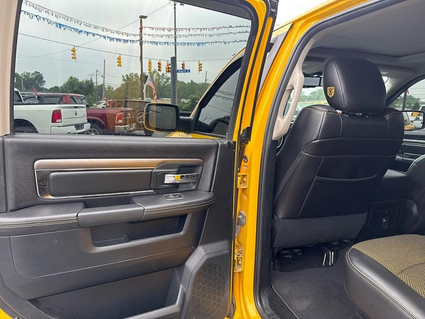 2016 YELLOW /BLACK RAM 1500 Sport Crew Cab SWB 4WD (1C6RR7MT1GS) with an 5.7L V8 OHV 16V engine, 6A transmission, located at 3304 Woodville Road, Northwood, OH, 43619, (419) 210-8019, 41.612694, -83.480743 - Your #1 Destination for Auto Loans and mdash;No Matter Your Credit!At our dealership, we believe everyone deserves the opportunity to drive their dream car and mdash;whether you have good credit, bad credit, or no credit at all. With a wide selection of hundreds of cars, trucks, and SUVs, you'll fin- Photo#10