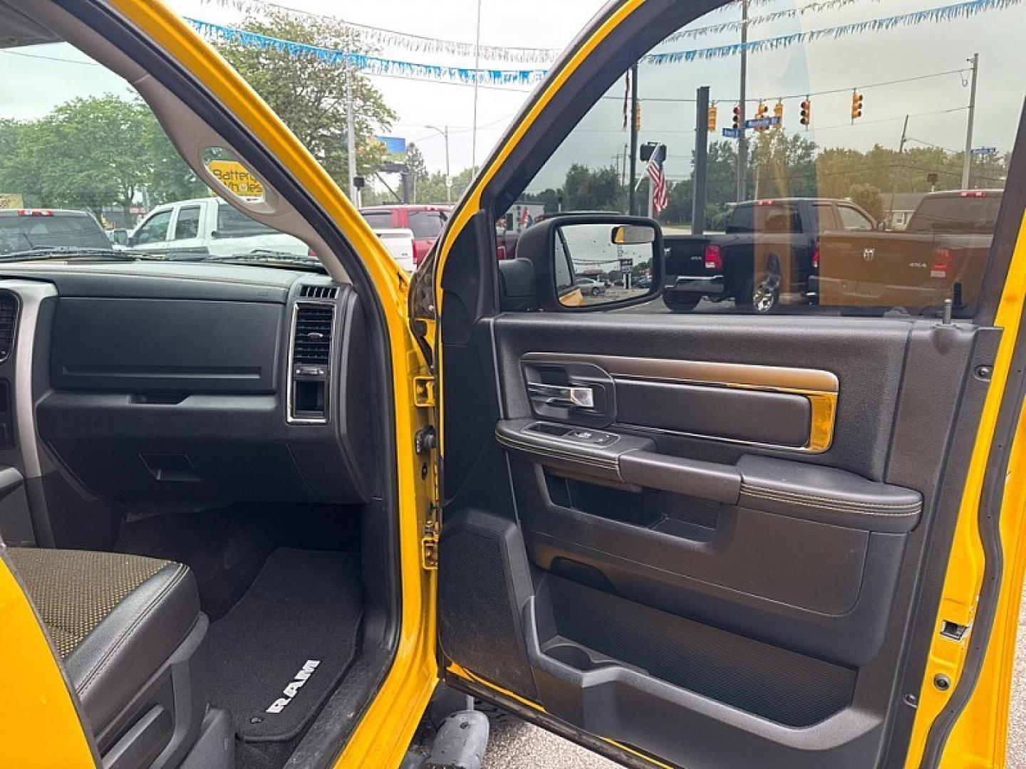 2016 YELLOW /BLACK RAM 1500 Sport Crew Cab SWB 4WD (1C6RR7MT1GS) with an 5.7L V8 OHV 16V engine, 6A transmission, located at 3304 Woodville Road, Northwood, OH, 43619, (419) 210-8019, 41.612694, -83.480743 - Your #1 Destination for Auto Loans and mdash;No Matter Your Credit!At our dealership, we believe everyone deserves the opportunity to drive their dream car and mdash;whether you have good credit, bad credit, or no credit at all. With a wide selection of hundreds of cars, trucks, and SUVs, you'll fin- Photo#14