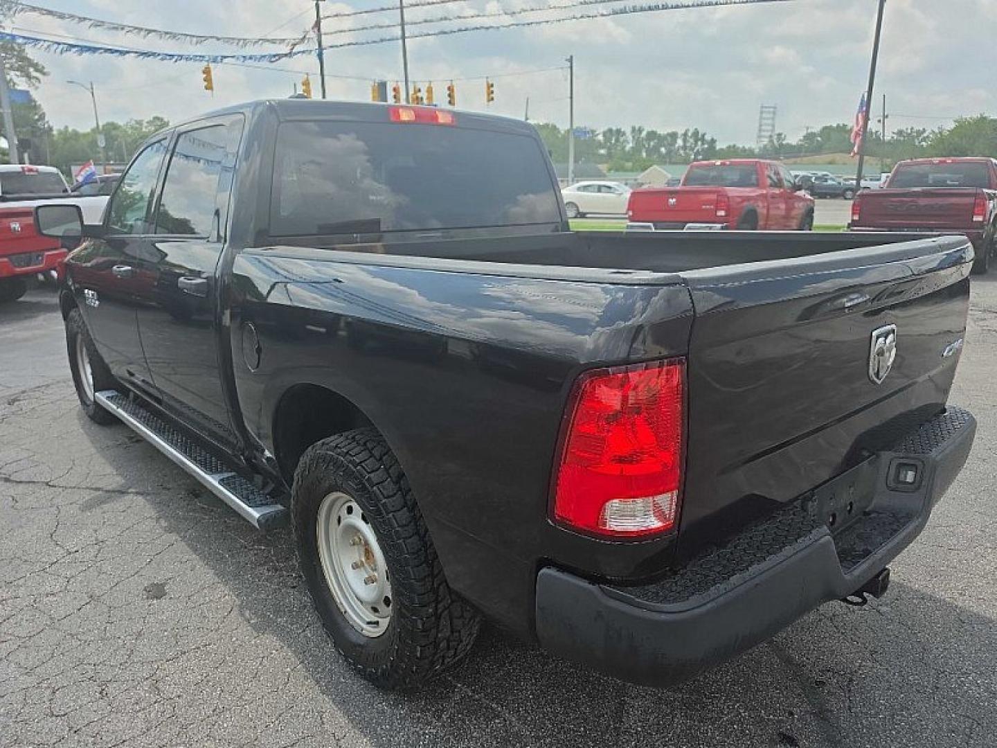 2019 BLACK /BLACK RAM 1500 Tradesman Crew Cab SWB 4WD (1C6RR7KG0KS) with an 3.6L V6 DOHC 24V FFV engine, 8A transmission, located at 3304 Woodville Road, Northwood, OH, 43619, (419) 210-8019, 41.612694, -83.480743 - Your #1 Destination for Auto Loans and mdash;No Matter Your Credit!At our dealership, we believe everyone deserves the opportunity to drive their dream car and mdash;whether you have good credit, bad credit, or no credit at all. With a wide selection of hundreds of cars, trucks, and SUVs, you'll fin- Photo#2