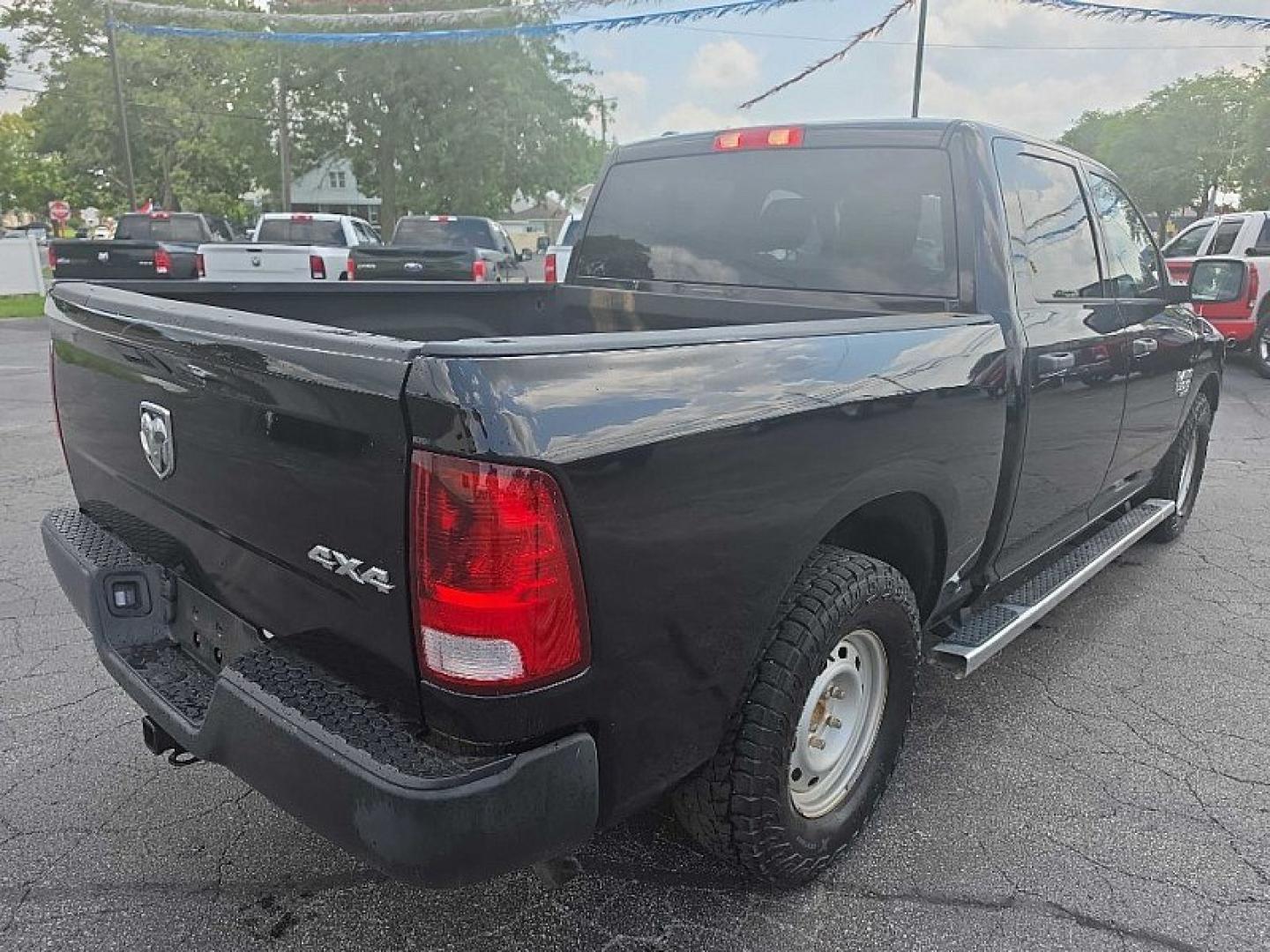 2019 BLACK /BLACK RAM 1500 Tradesman Crew Cab SWB 4WD (1C6RR7KG0KS) with an 3.6L V6 DOHC 24V FFV engine, 8A transmission, located at 3304 Woodville Road, Northwood, OH, 43619, (419) 210-8019, 41.612694, -83.480743 - Your #1 Destination for Auto Loans and mdash;No Matter Your Credit!At our dealership, we believe everyone deserves the opportunity to drive their dream car and mdash;whether you have good credit, bad credit, or no credit at all. With a wide selection of hundreds of cars, trucks, and SUVs, you'll fin- Photo#4