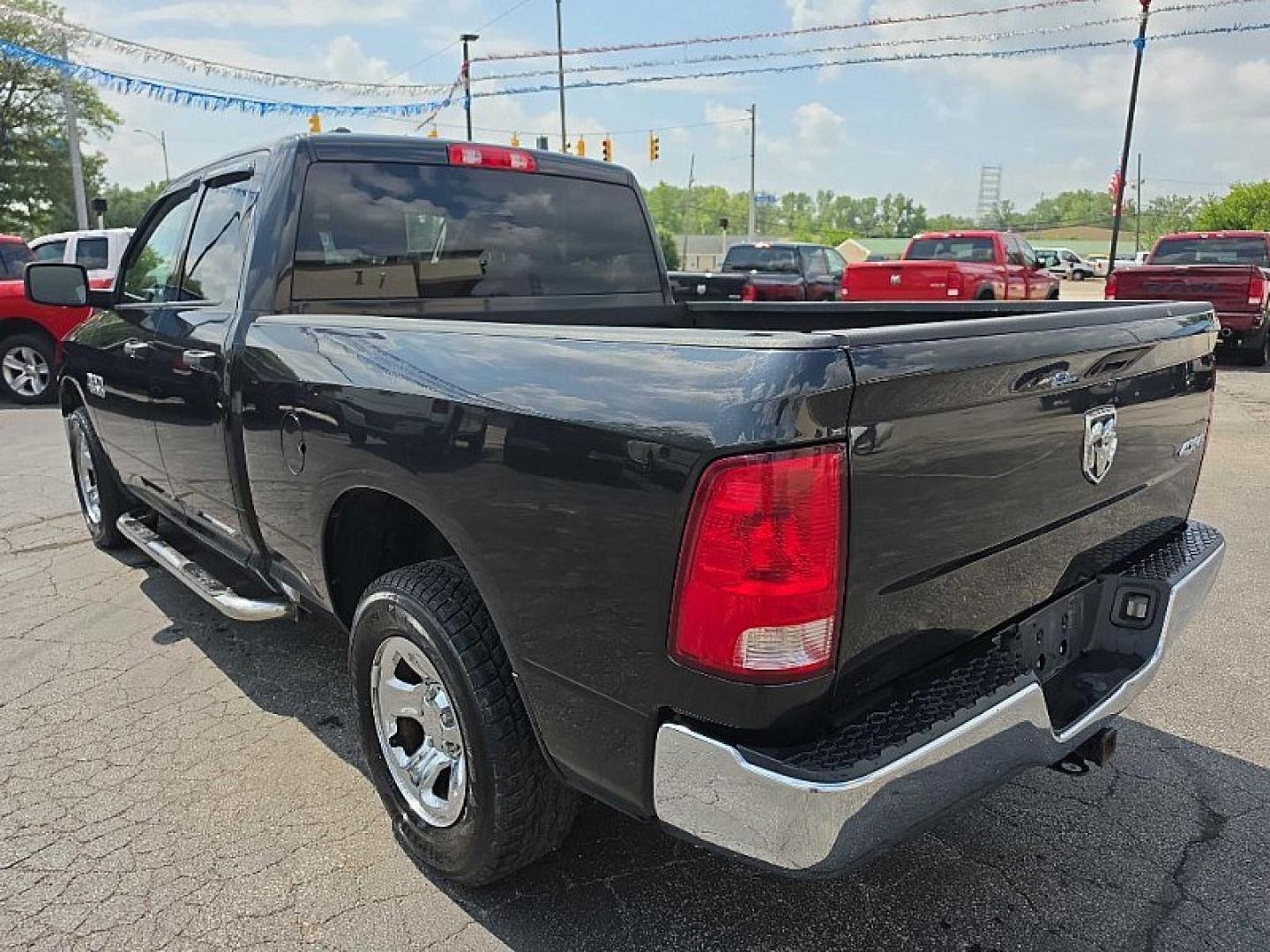 2017 BLACK /BLACK RAM 1500 Tradesman Quad Cab 4WD (1C6RR7FG8HS) with an 3.6L V6 DOHC 24V FFV engine, 8A transmission, located at 3304 Woodville Road, Northwood, OH, 43619, (419) 210-8019, 41.612694, -83.480743 - Your #1 Destination for Auto Loans and mdash;No Matter Your Credit!At our dealership, we believe everyone deserves the opportunity to drive their dream car and mdash;whether you have good credit, bad credit, or no credit at all. With a wide selection of hundreds of cars, trucks, and SUVs, you'll fin- Photo#2