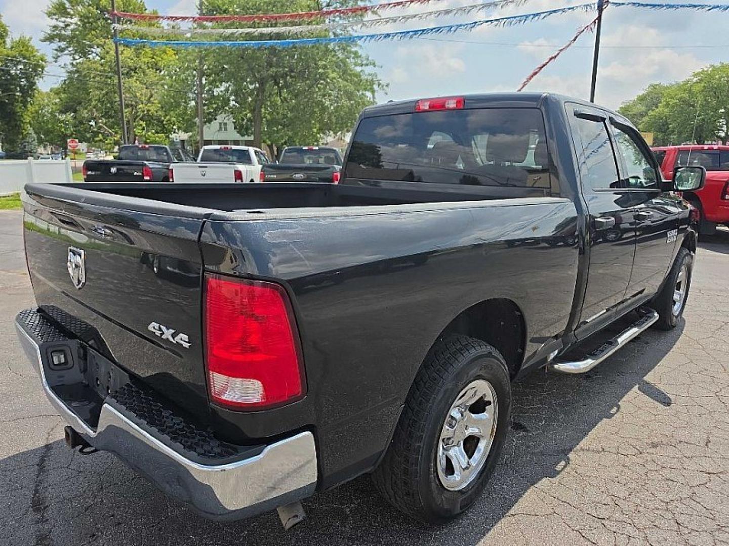 2017 BLACK /BLACK RAM 1500 Tradesman Quad Cab 4WD (1C6RR7FG8HS) with an 3.6L V6 DOHC 24V FFV engine, 8A transmission, located at 3304 Woodville Road, Northwood, OH, 43619, (419) 210-8019, 41.612694, -83.480743 - Your #1 Destination for Auto Loans and mdash;No Matter Your Credit!At our dealership, we believe everyone deserves the opportunity to drive their dream car and mdash;whether you have good credit, bad credit, or no credit at all. With a wide selection of hundreds of cars, trucks, and SUVs, you'll fin- Photo#4
