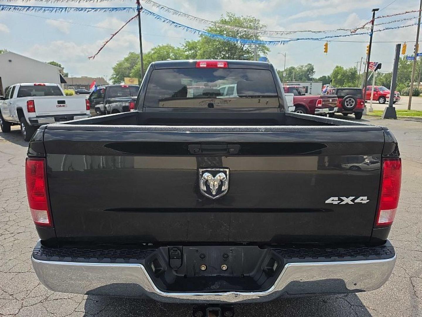 2017 BLACK /BLACK RAM 1500 Tradesman Quad Cab 4WD (1C6RR7FG8HS) with an 3.6L V6 DOHC 24V FFV engine, 8A transmission, located at 3304 Woodville Road, Northwood, OH, 43619, (419) 210-8019, 41.612694, -83.480743 - Your #1 Destination for Auto Loans and mdash;No Matter Your Credit!At our dealership, we believe everyone deserves the opportunity to drive their dream car and mdash;whether you have good credit, bad credit, or no credit at all. With a wide selection of hundreds of cars, trucks, and SUVs, you'll fin- Photo#3