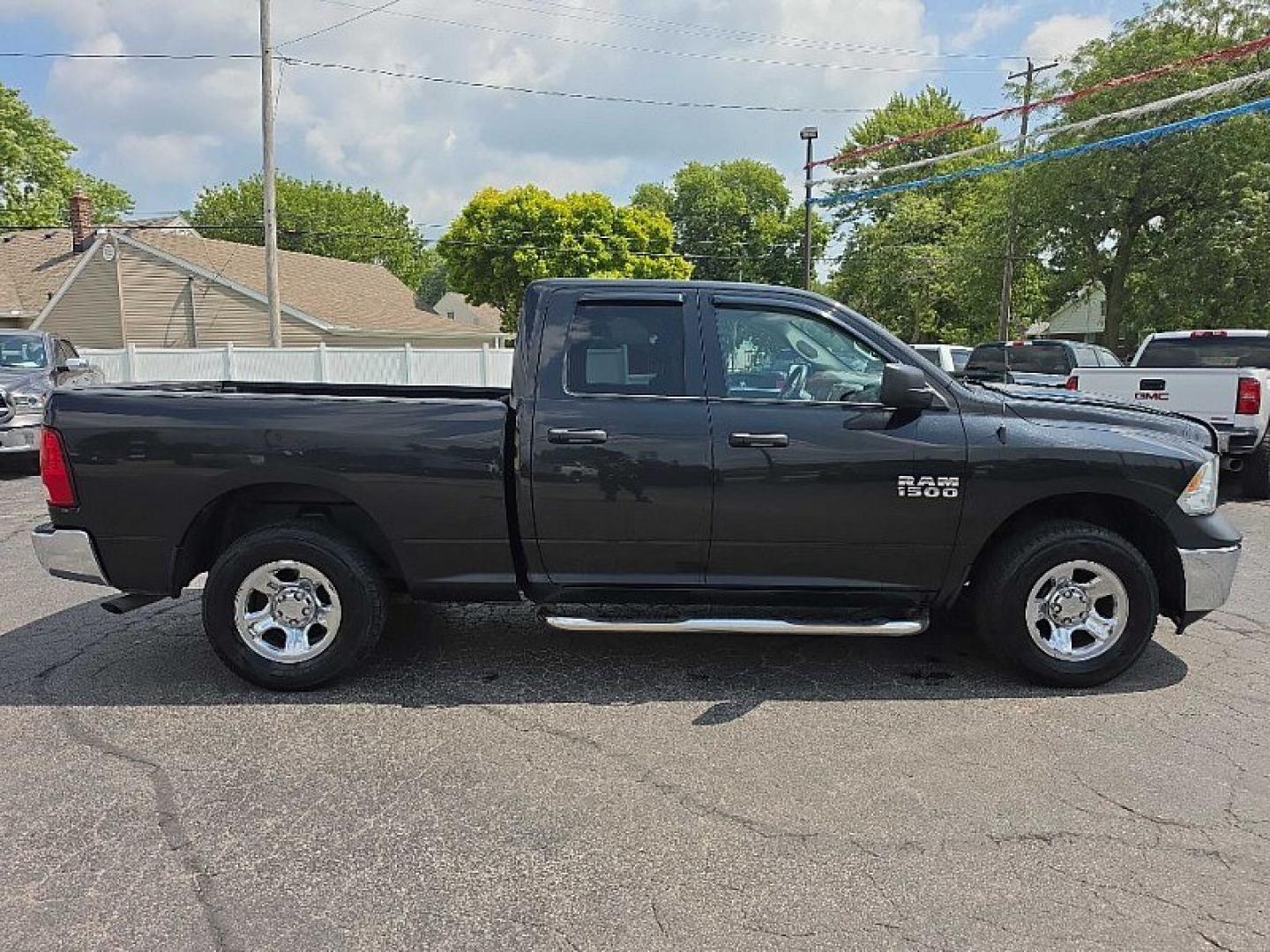 2017 BLACK /BLACK RAM 1500 Tradesman Quad Cab 4WD (1C6RR7FG8HS) with an 3.6L V6 DOHC 24V FFV engine, 8A transmission, located at 3304 Woodville Road, Northwood, OH, 43619, (419) 210-8019, 41.612694, -83.480743 - Your #1 Destination for Auto Loans and mdash;No Matter Your Credit!At our dealership, we believe everyone deserves the opportunity to drive their dream car and mdash;whether you have good credit, bad credit, or no credit at all. With a wide selection of hundreds of cars, trucks, and SUVs, you'll fin- Photo#5