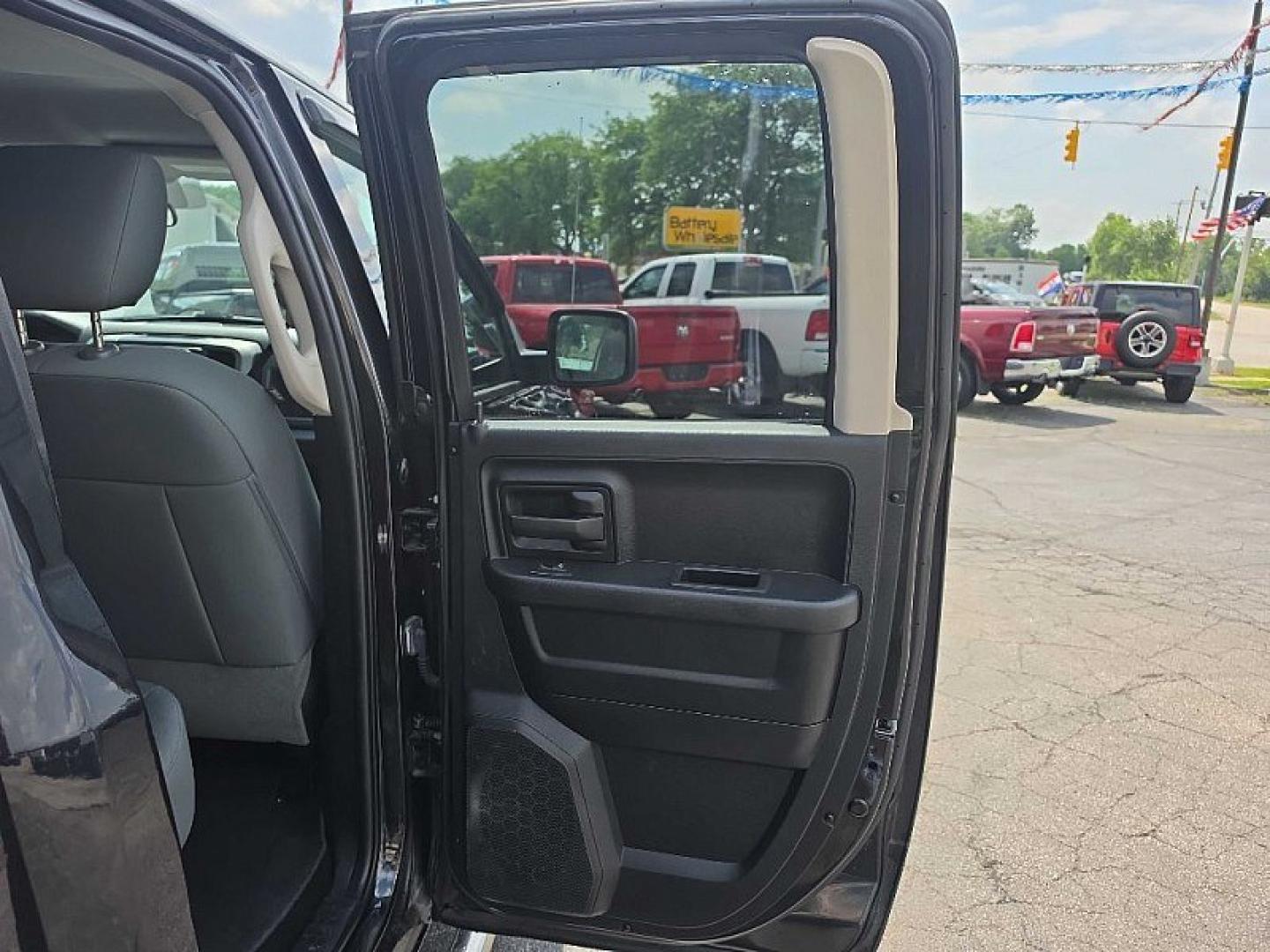2017 BLACK /BLACK RAM 1500 Tradesman Quad Cab 4WD (1C6RR7FG8HS) with an 3.6L V6 DOHC 24V FFV engine, 8A transmission, located at 3304 Woodville Road, Northwood, OH, 43619, (419) 210-8019, 41.612694, -83.480743 - Your #1 Destination for Auto Loans and mdash;No Matter Your Credit!At our dealership, we believe everyone deserves the opportunity to drive their dream car and mdash;whether you have good credit, bad credit, or no credit at all. With a wide selection of hundreds of cars, trucks, and SUVs, you'll fin- Photo#13