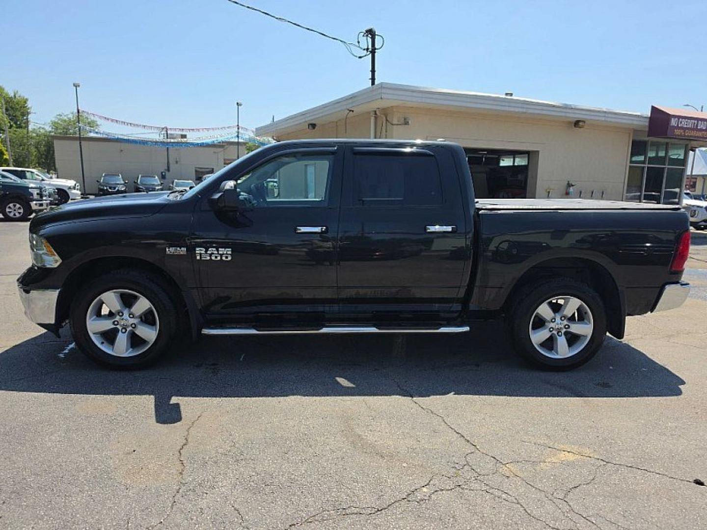 2017 BLACK /GRAY RAM 1500 SLT Crew Cab SWB 4WD (1C6RR7LT0HS) with an 5.7L V8 OHV 16V engine, 8A transmission, located at 3304 Woodville Road, Northwood, OH, 43619, (419) 210-8019, 41.612694, -83.480743 - Your #1 Destination for Auto Loans and mdash;No Matter Your Credit!At our dealership, we believe everyone deserves the opportunity to drive their dream car and mdash;whether you have good credit, bad credit, or no credit at all. With a wide selection of hundreds of cars, trucks, and SUVs, you'll fin- Photo#1