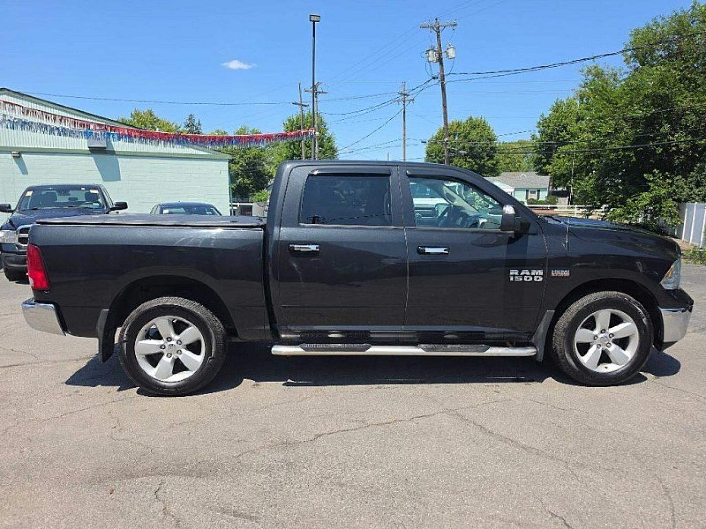 2017 BLACK /GRAY RAM 1500 SLT Crew Cab SWB 4WD (1C6RR7LT0HS) with an 5.7L V8 OHV 16V engine, 8A transmission, located at 3304 Woodville Road, Northwood, OH, 43619, (419) 210-8019, 41.612694, -83.480743 - Your #1 Destination for Auto Loans and mdash;No Matter Your Credit!At our dealership, we believe everyone deserves the opportunity to drive their dream car and mdash;whether you have good credit, bad credit, or no credit at all. With a wide selection of hundreds of cars, trucks, and SUVs, you'll fin- Photo#5