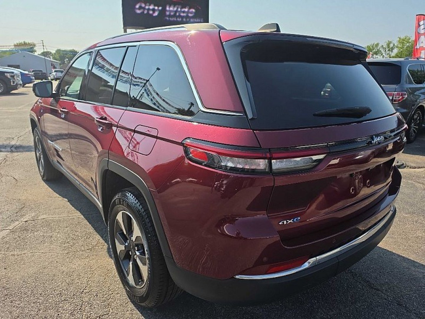 2023 RED /BLACK Jeep Grand Cherokee 4xe Limited (1C4RJYB6XPC) with an 2.0L L4 DOHC 16V HYBRID engine, 8A transmission, located at 3304 Woodville Road, Northwood, OH, 43619, (419) 210-8019, 41.612694, -83.480743 - Your #1 Destination for Auto Loans and mdash;No Matter Your Credit!At our dealership, we believe everyone deserves the opportunity to drive their dream car and mdash;whether you have good credit, bad credit, or no credit at all. With a wide selection of hundreds of cars, trucks, and SUVs, you'll fin- Photo#0