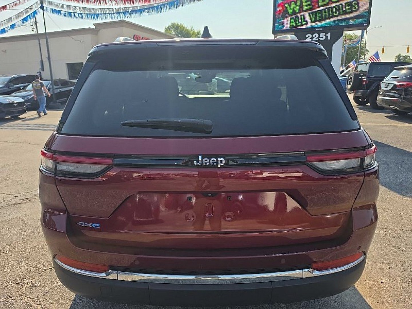 2023 RED /BLACK Jeep Grand Cherokee 4xe Limited (1C4RJYB6XPC) with an 2.0L L4 DOHC 16V HYBRID engine, 8A transmission, located at 3304 Woodville Road, Northwood, OH, 43619, (419) 210-8019, 41.612694, -83.480743 - Your #1 Destination for Auto Loans and mdash;No Matter Your Credit!At our dealership, we believe everyone deserves the opportunity to drive their dream car and mdash;whether you have good credit, bad credit, or no credit at all. With a wide selection of hundreds of cars, trucks, and SUVs, you'll fin- Photo#1