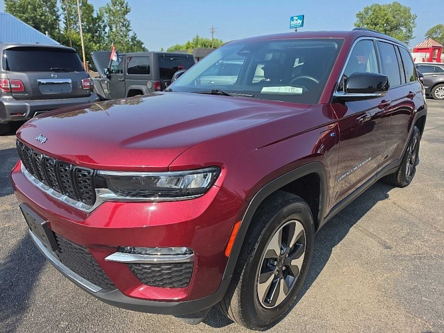 2023 RED /BLACK Jeep Grand Cherokee 4xe Limited (1C4RJYB6XPC) with an 2.0L L4 DOHC 16V HYBRID engine, 8A transmission, located at 3304 Woodville Road, Northwood, OH, 43619, (419) 210-8019, 41.612694, -83.480743 - Your #1 Destination for Auto Loans and mdash;No Matter Your Credit!At our dealership, we believe everyone deserves the opportunity to drive their dream car and mdash;whether you have good credit, bad credit, or no credit at all. With a wide selection of hundreds of cars, trucks, and SUVs, you'll fin- Photo#2