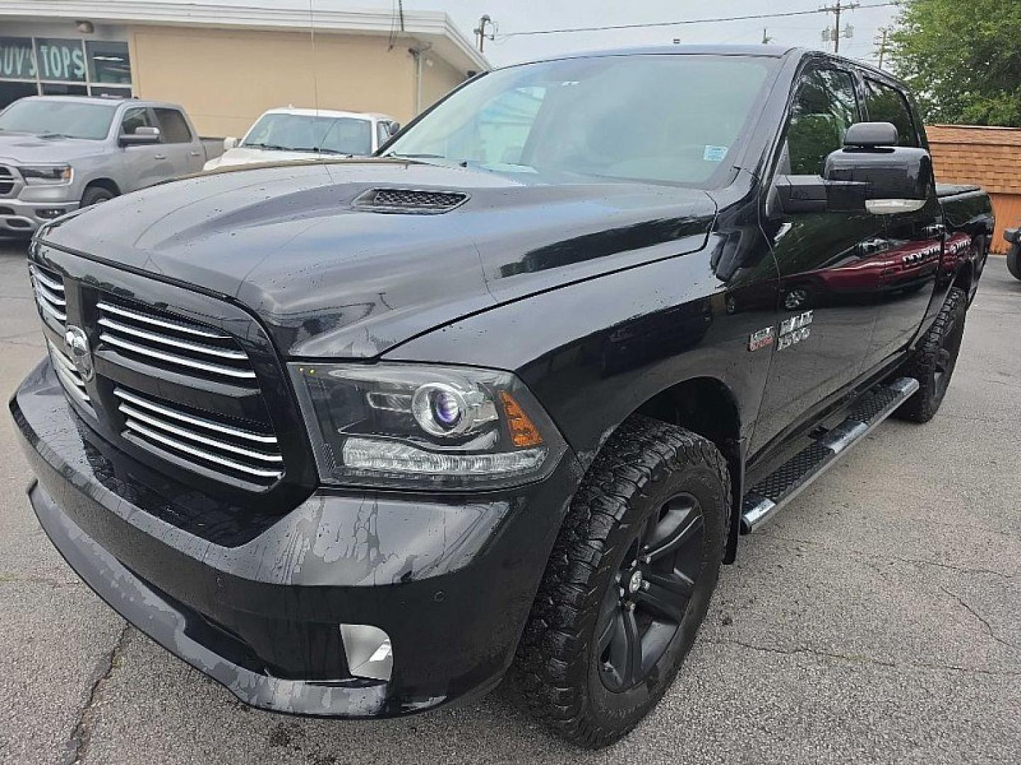 2014 BLACK /BLACK RAM 1500 Sport Crew Cab SWB 4WD (1C6RR7MT2ES) with an 5.7L V8 OHV 16V engine, 6-Speed Automatic transmission, located at 3304 Woodville Road, Northwood, OH, 43619, (419) 210-8019, 41.612694, -83.480743- Photo#0