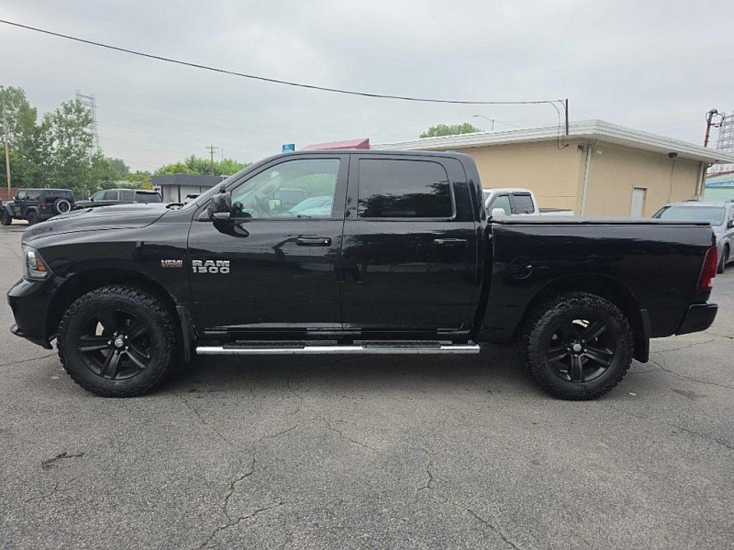 2014 BLACK /BLACK RAM 1500 Sport Crew Cab SWB 4WD (1C6RR7MT2ES) with an 5.7L V8 OHV 16V engine, 6-Speed Automatic transmission, located at 3304 Woodville Road, Northwood, OH, 43619, (419) 210-8019, 41.612694, -83.480743- Photo#1